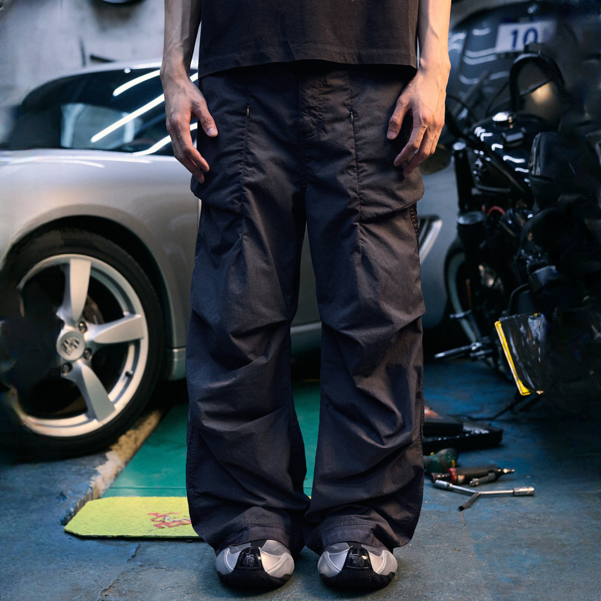 AVINMADE Paint-Splattered Nylon Parachute Pants — square · front