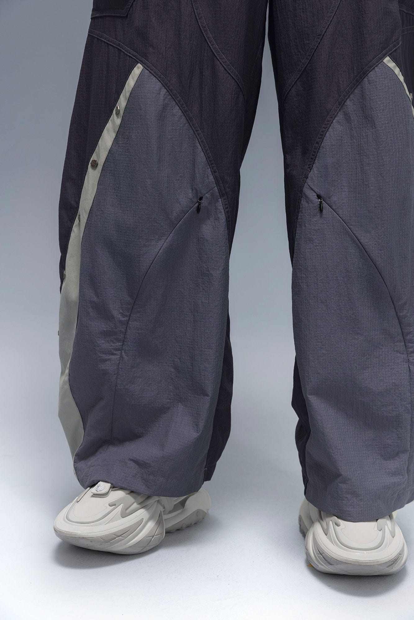 XIPHEVIL Deconstructed Contrast Panel Utility Curved Pants, premium urban and streetwear designers apparel on PROJECTISR.com, XIPHEVIL