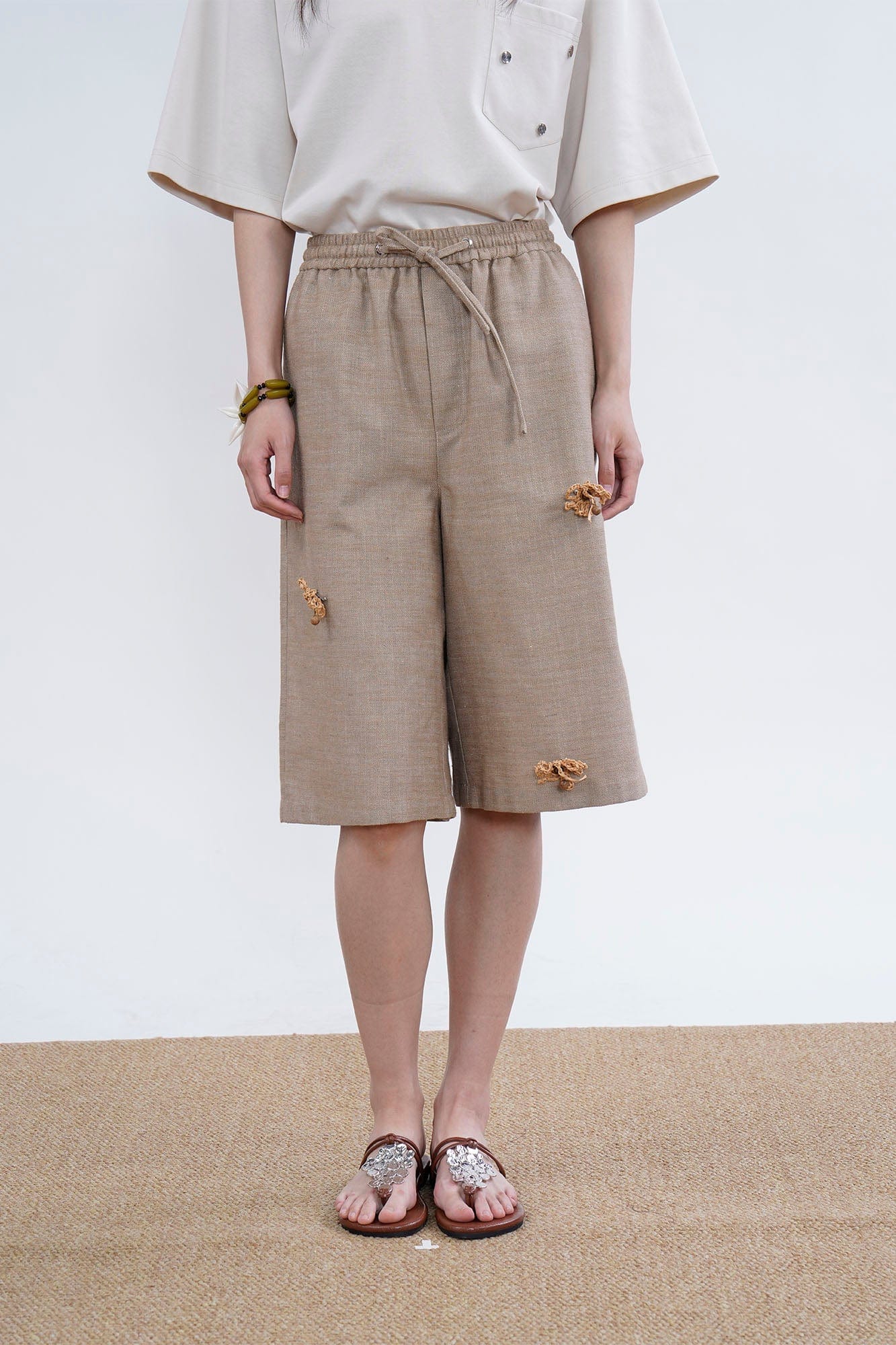 ORAL UTOPIA Tassel Flower Embellished Linen Blend Shorts, premium urban and streetwear designers apparel on PROJECTISR.com, ORAL UTOPIA