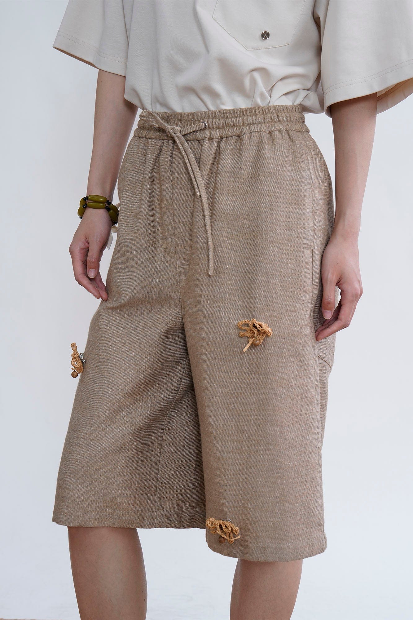 ORAL UTOPIA Tassel Flower Embellished Linen Blend Shorts, premium urban and streetwear designers apparel on PROJECTISR.com, ORAL UTOPIA