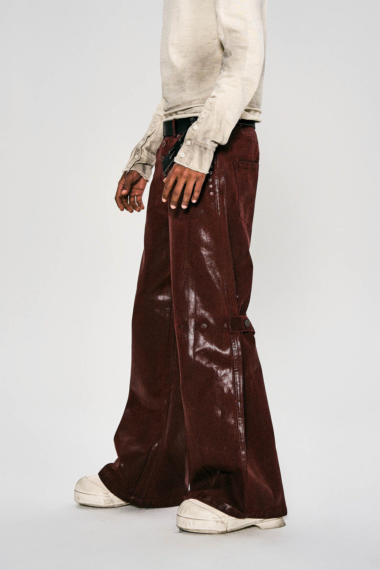 FLYERRER Waxed Spliced Studded Flared Pants, premium urban and streetwear designers apparel on PROJECTISR.com, FLYERRER