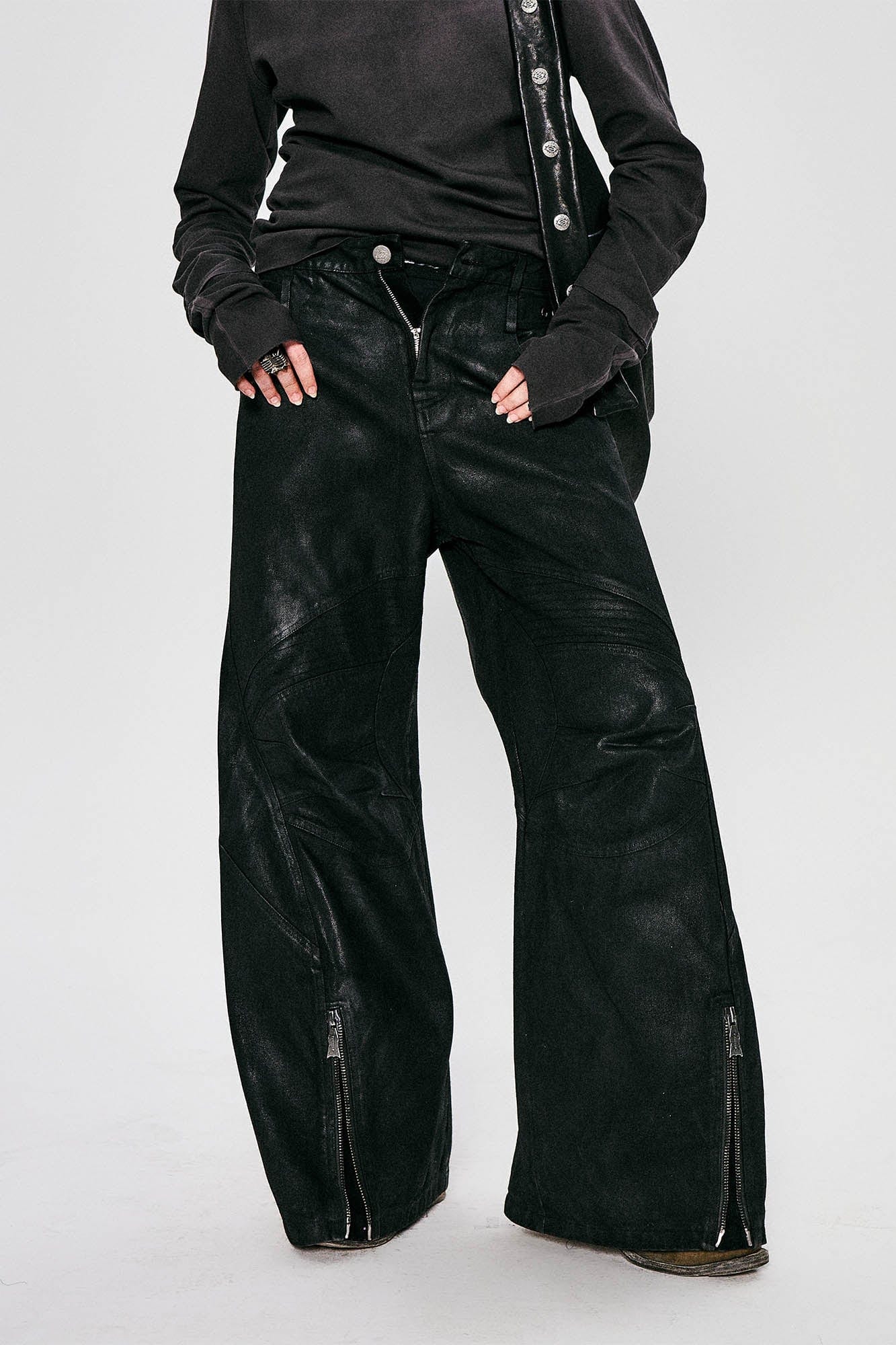 FLYERRER Waxed Deconstructed-Knee Zip-Hem Flared Pants, premium urban and streetwear designers apparel on PROJECTISR.com, FLYERRER