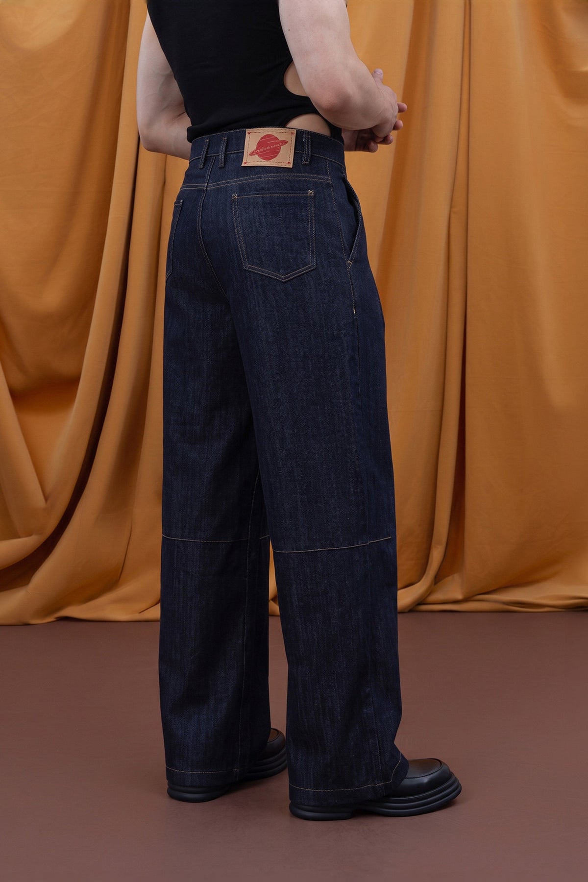 CLP Pleated Washed Wide-Leg Jeans — half body