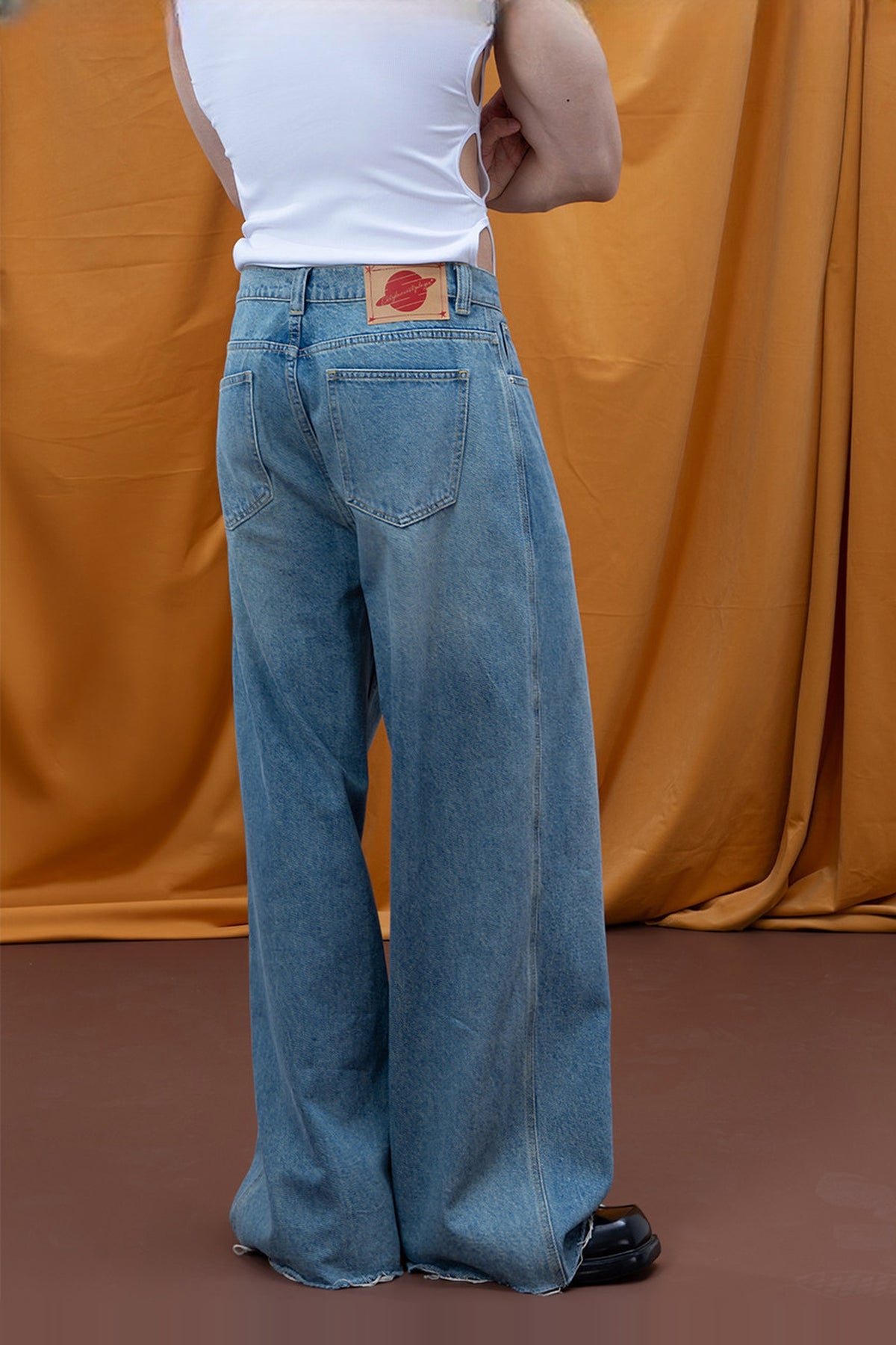 CLP Retro Distressed Frayed Wide-Leg Jeans — half body