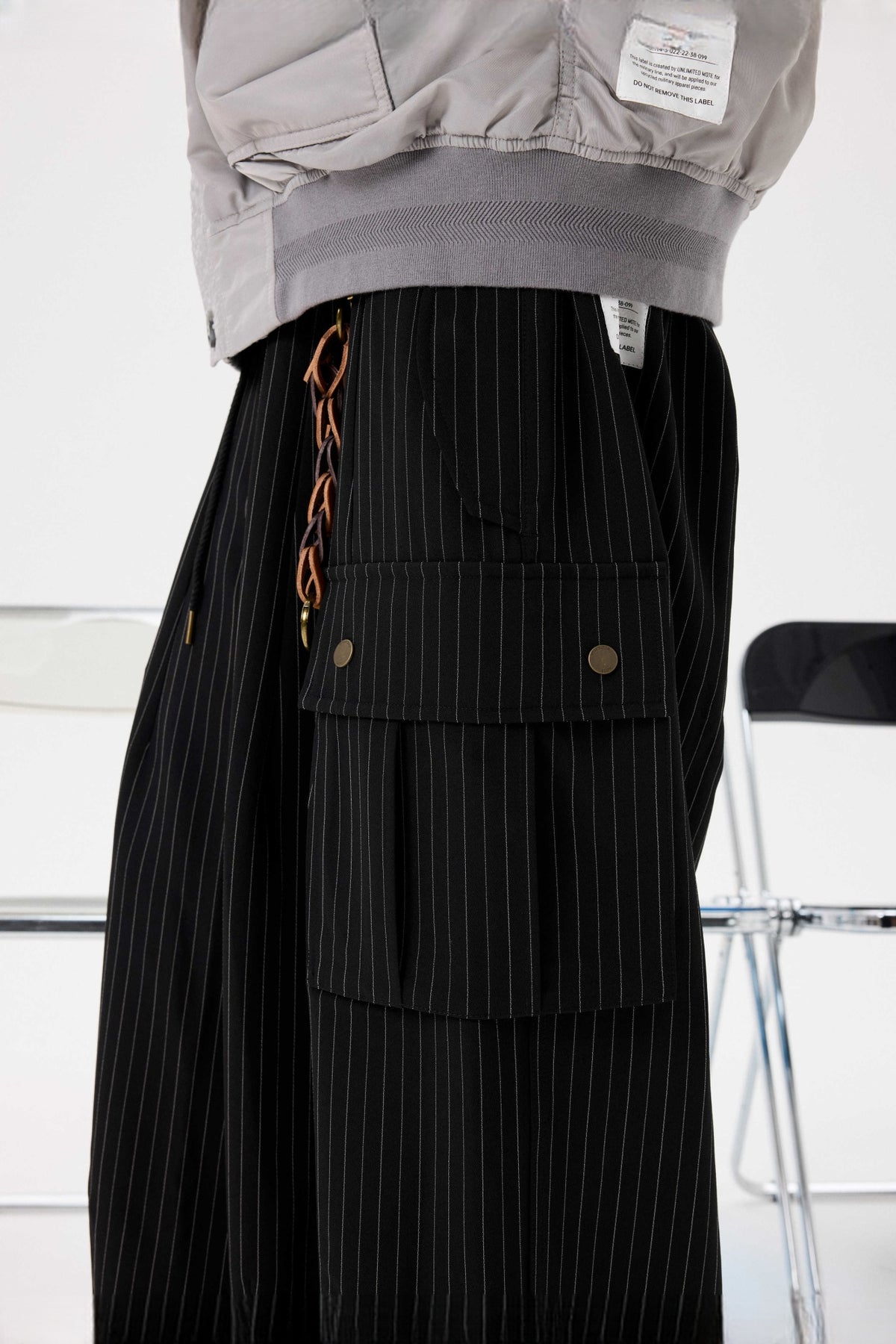 UNLIMITED MOTE Striped Drawstring Balloon Wide-Leg Cargo Pants — half body · Black