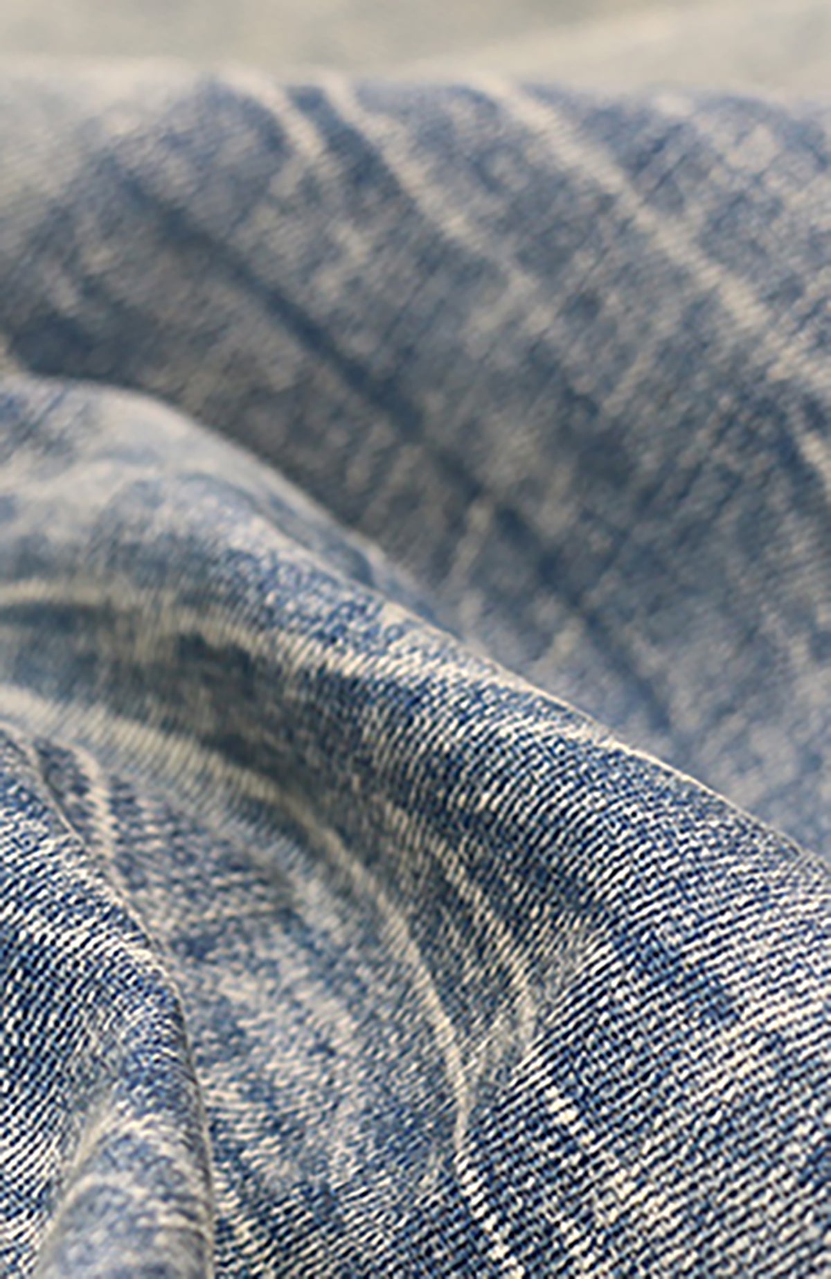 RELABEL Washed Curved-Blade Jeans