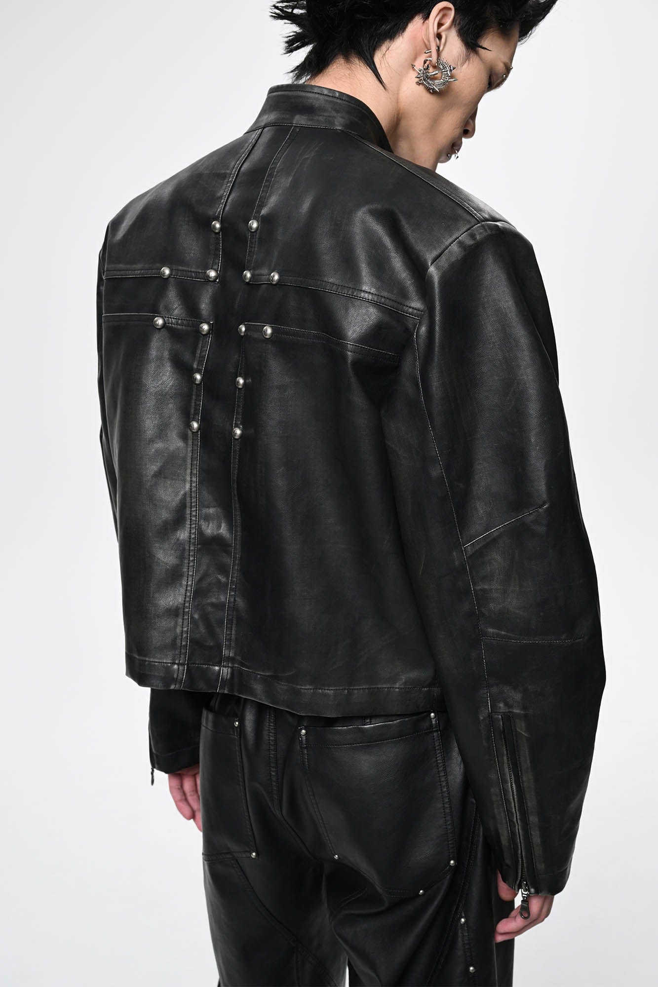 SAVAGEGROWTHWORLD Crossed Spliced Rivet Faux Leather Jacket, premium urban and streetwear designers apparel on PROJECTISR.com, SAVAGEGROWTHWORLD