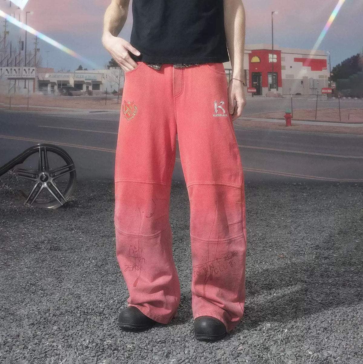 KLICK CLAK Paint-Splattered Graphic Curved Sweatpants