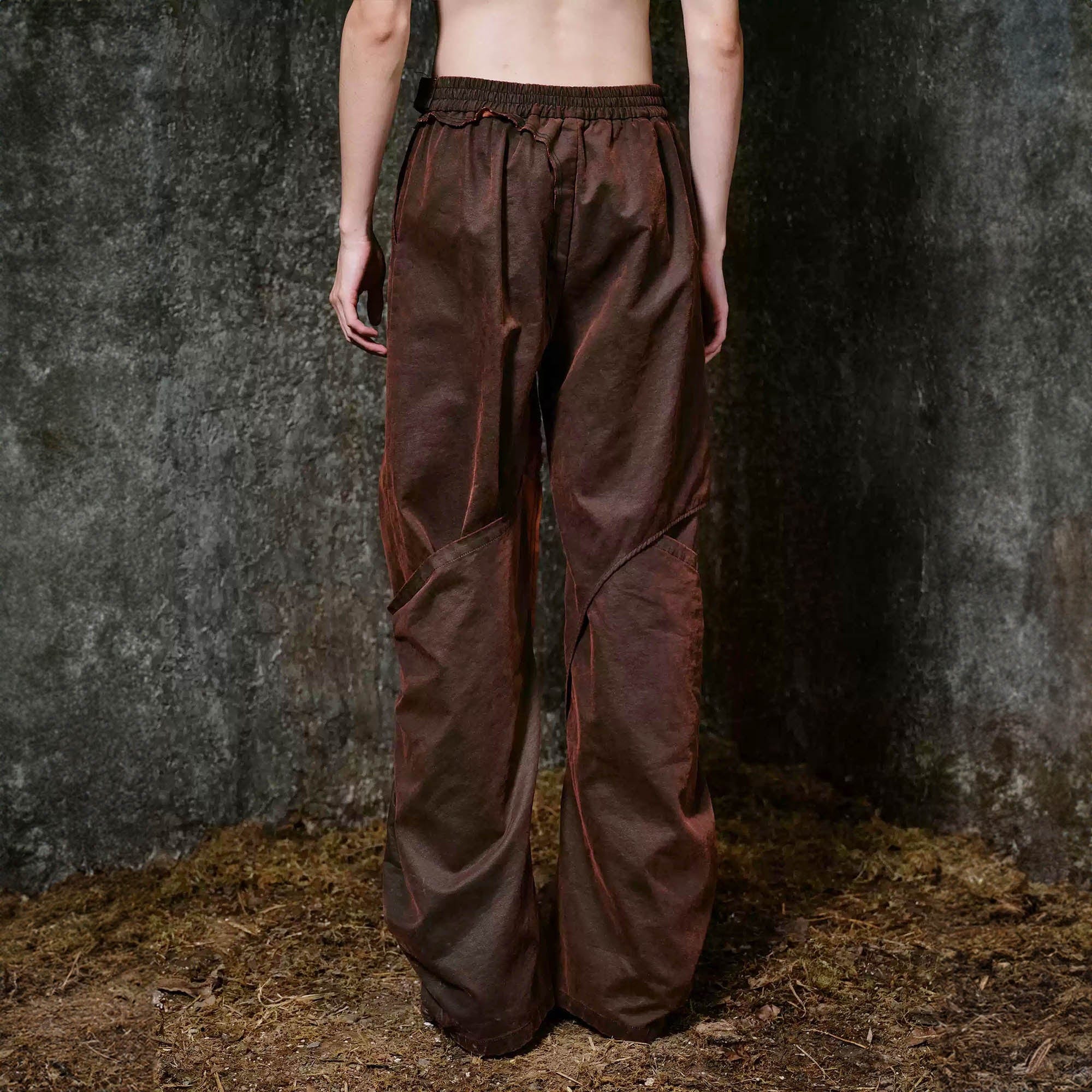 ILNya Nieternite Nifutur Weathered Coated Deconstructed Trousers, premium urban and streetwear designers apparel on PROJECTISR.com, ILNya Nieternite Nifutur