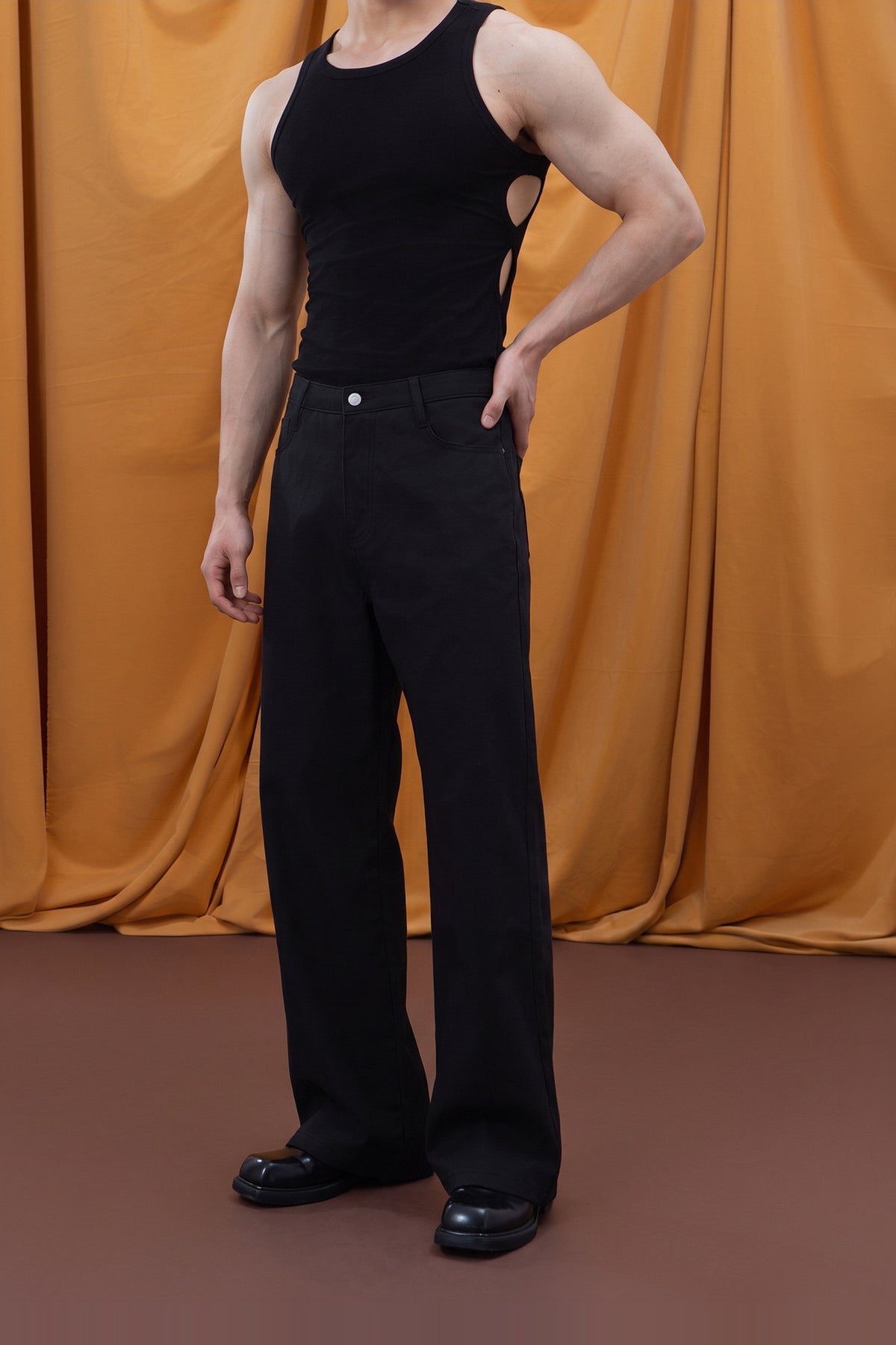 CLP Relaxed Wide-Leg Trousers — half body · Black