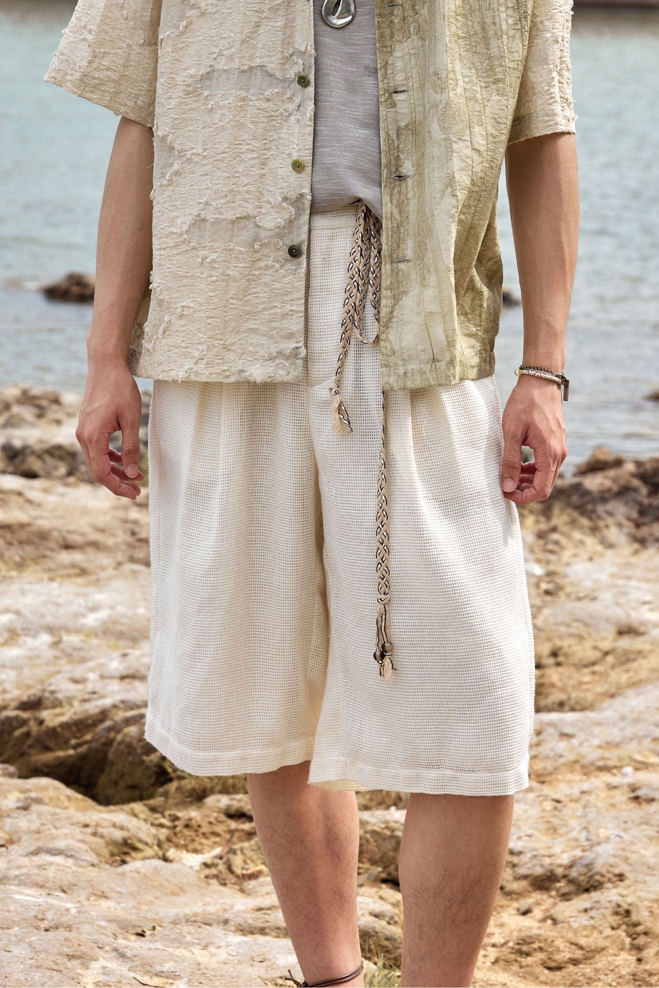 ALVNG AR ANTS Textured Mesh Pleated Braided Tassel Belt Shorts, premium urban and streetwear designers apparel on PROJECTISR.com, ALVNG AR ANTS