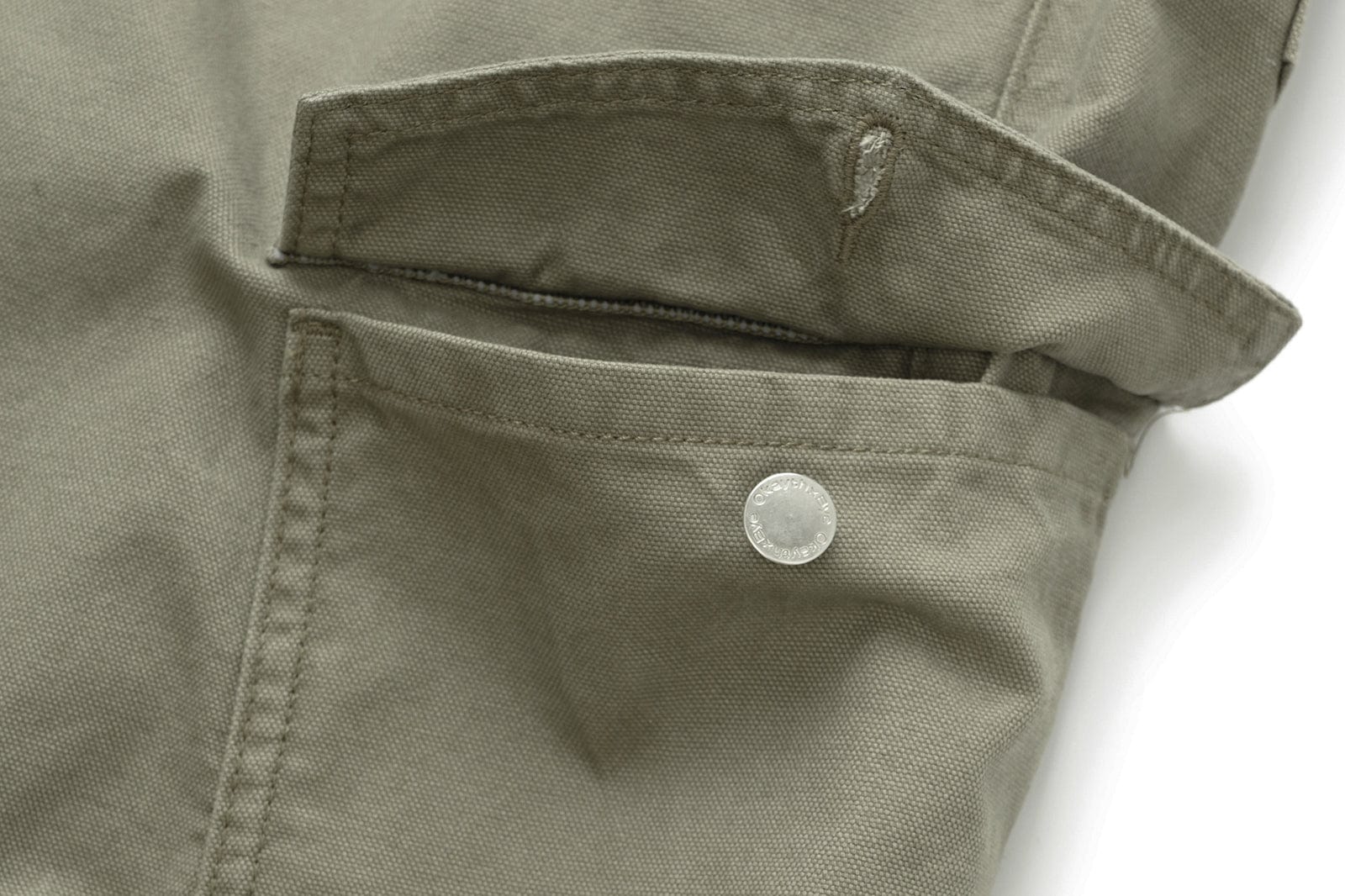 OKAYTHXBYE Washed Button Flap-Pocket Cargo Pants, premium urban and streetwear designers apparel on PROJECTISR.com, OKAYTHXBYE
