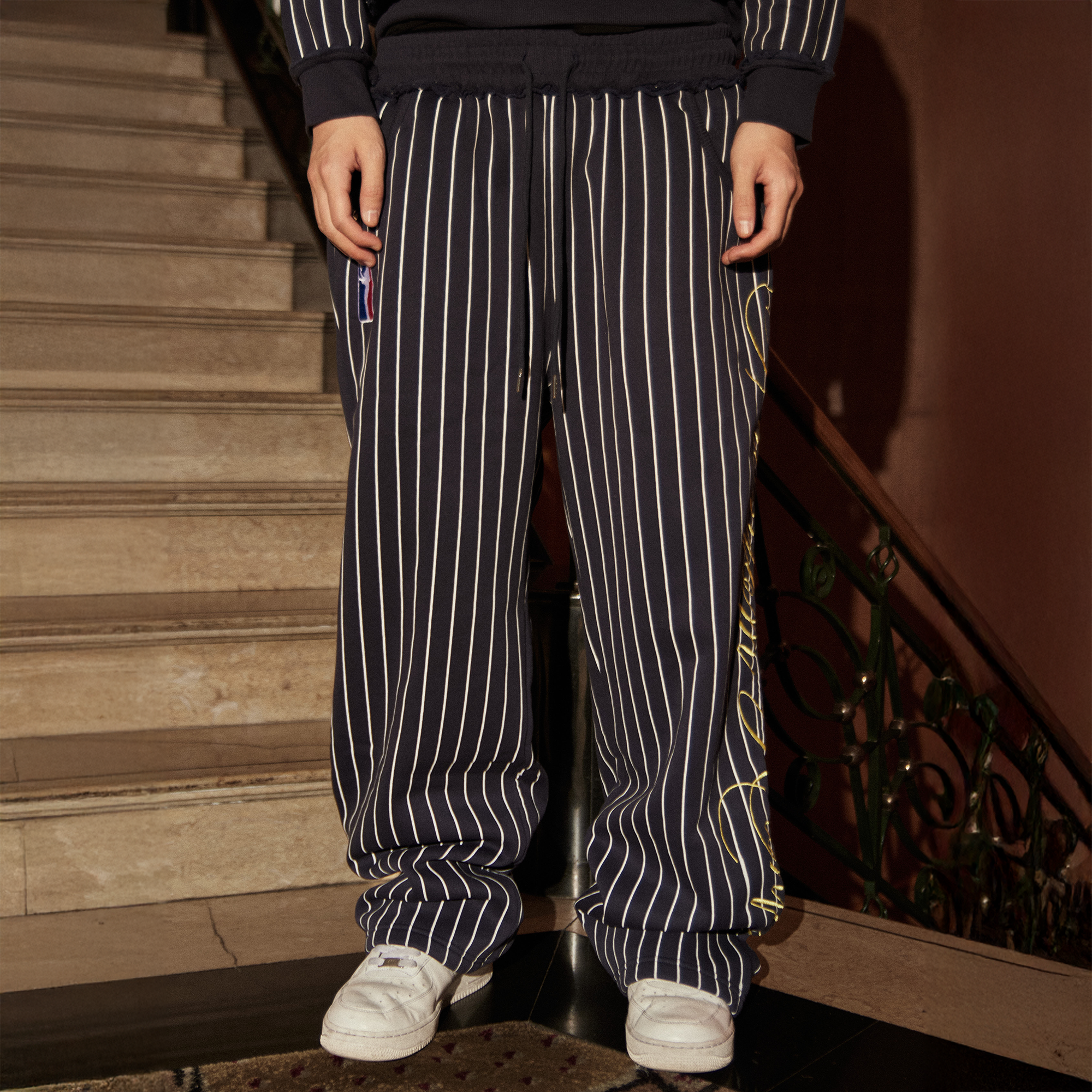 PHANTOMHUNTER Stripe Embroidered Studded Pants, premium urban and streetwear designers apparel on PROJECTISR.com, PHANTOMHUNTER