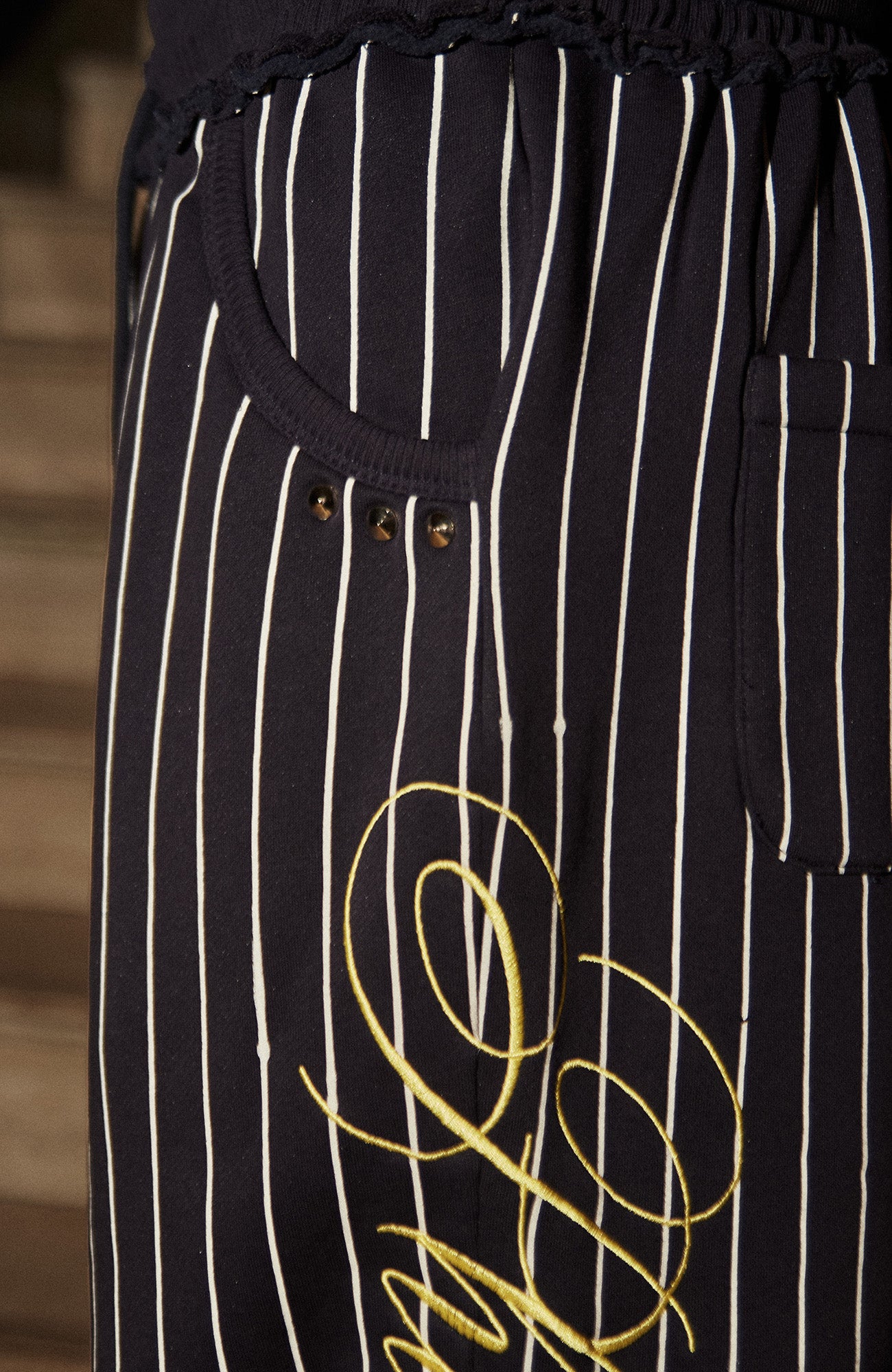 PHANTOMHUNTER Stripe Embroidered Studded Pants, premium urban and streetwear designers apparel on PROJECTISR.com, PHANTOMHUNTER