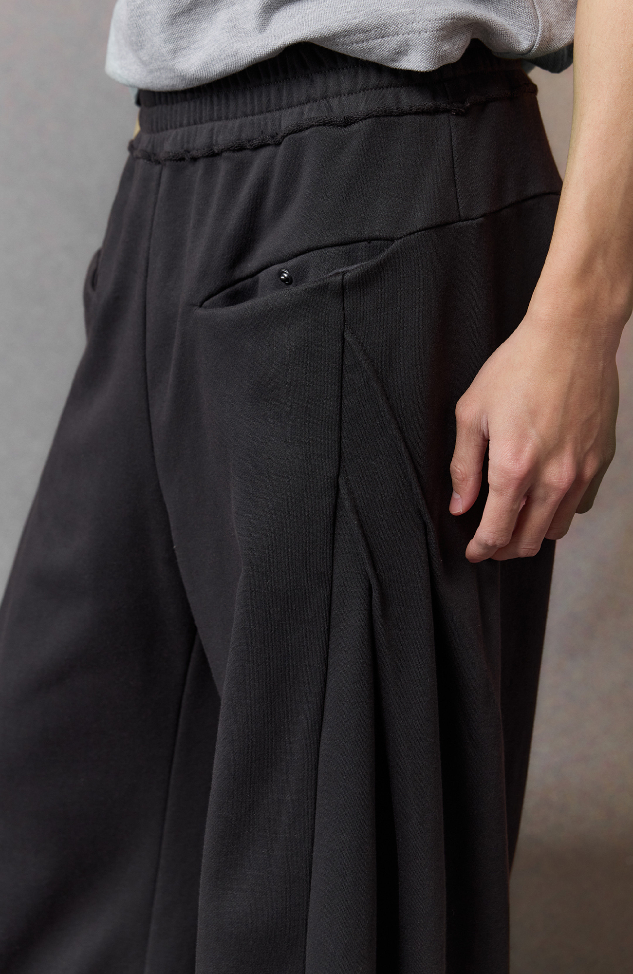 ALVNG AR ANTS Curved-Leg Pleated Raw-Hem Sweatpants, premium urban and streetwear designers apparel on PROJECTISR.com, ALVNG AR ANTS