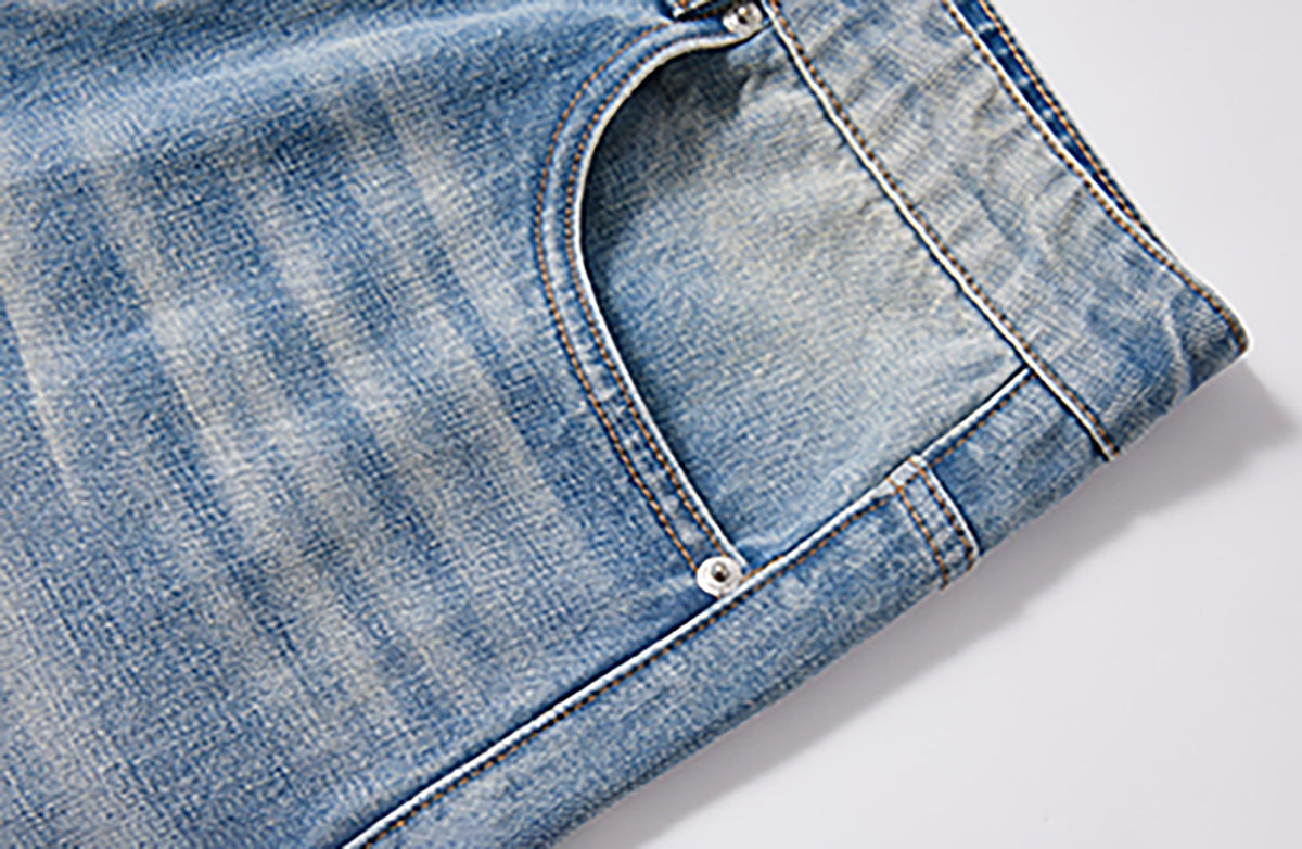 KREATE Whisker-Crease Flared Jeans