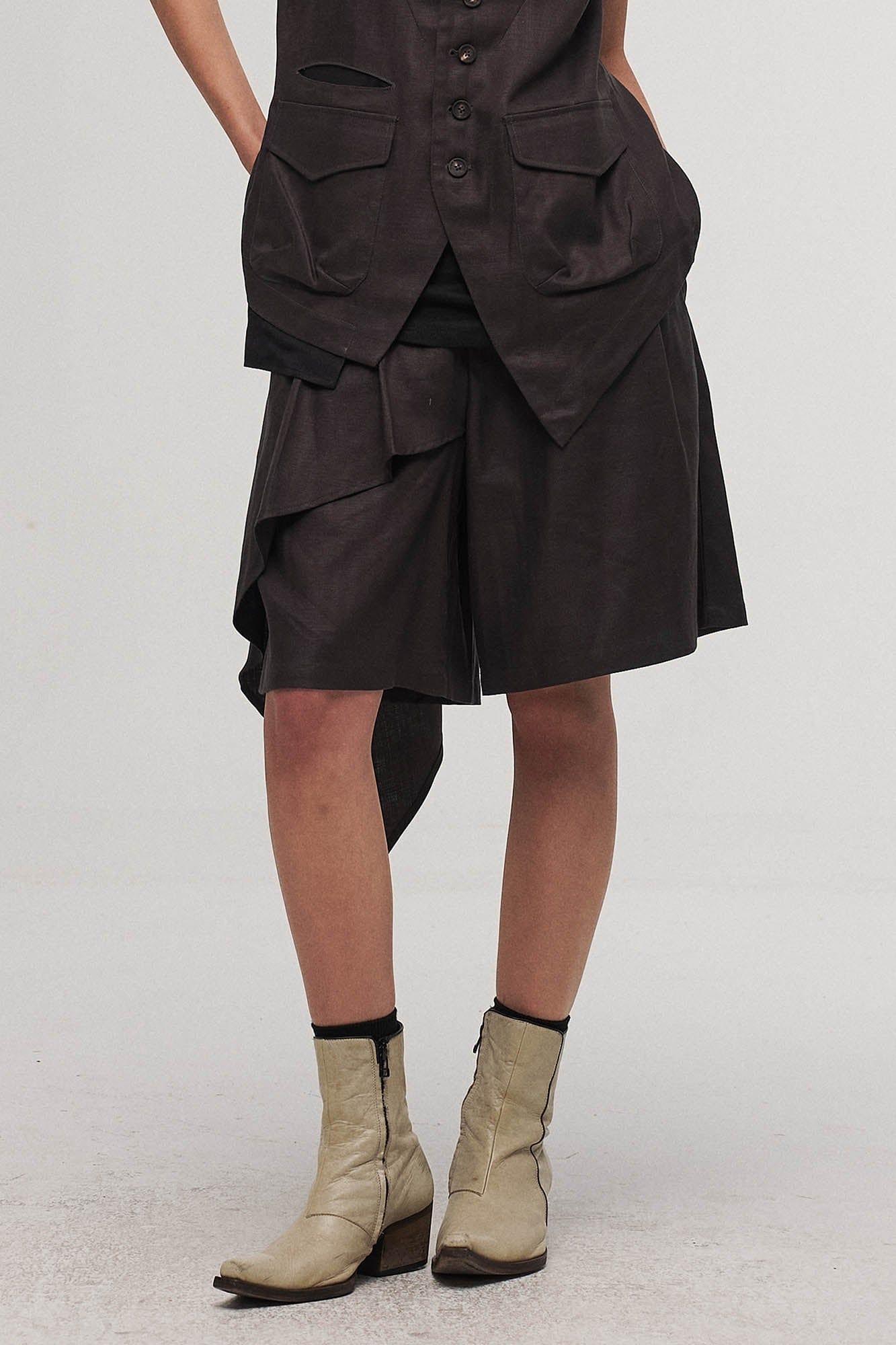 ILNya Nieternite Nifutur Asymmetrical Draped Pleated Shorts, premium urban and streetwear designers apparel on PROJECTISR.com, ILNya Nieternite Nifutur
