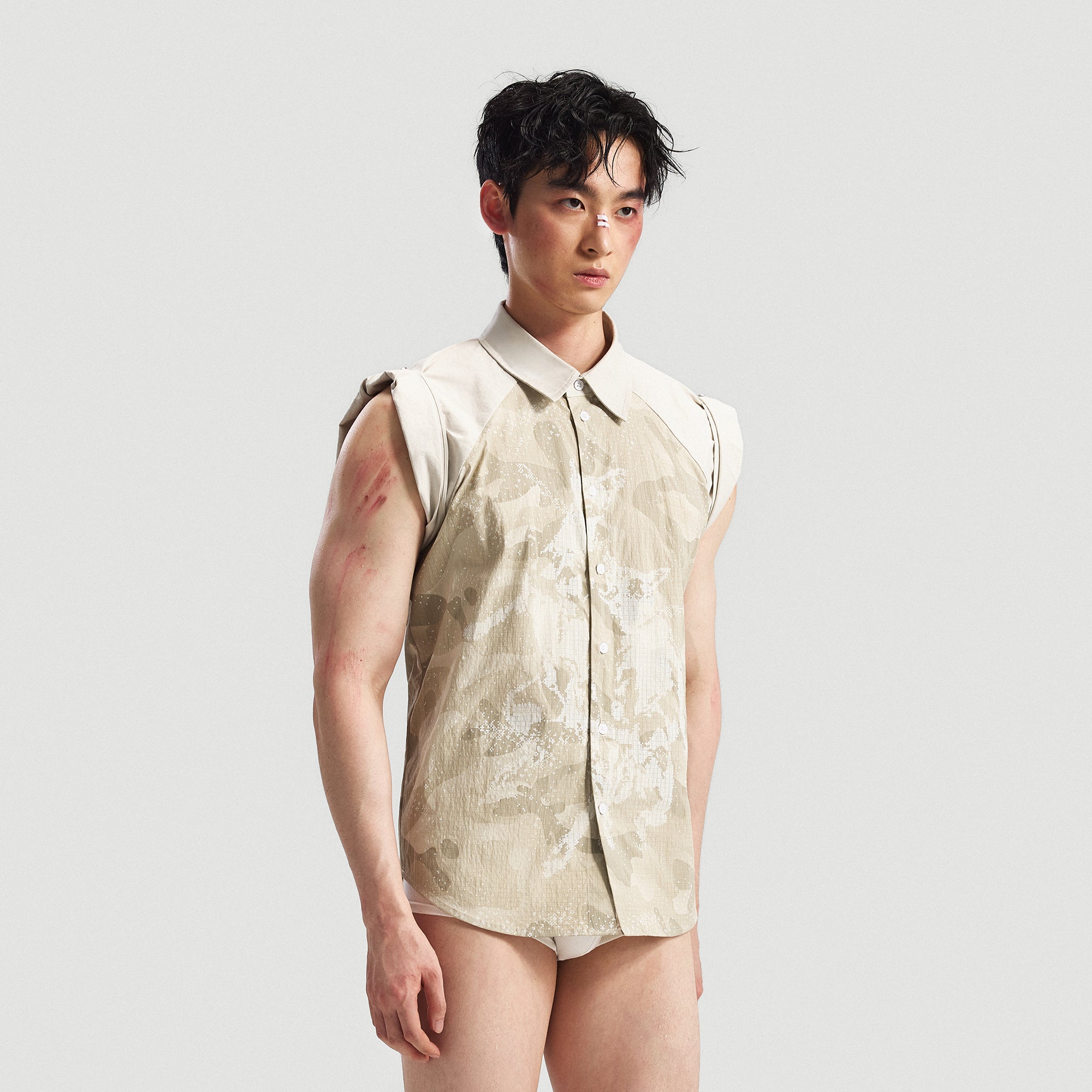 INTERRUPT Camo Graphic Sleeveless Studded Raglan Shirt