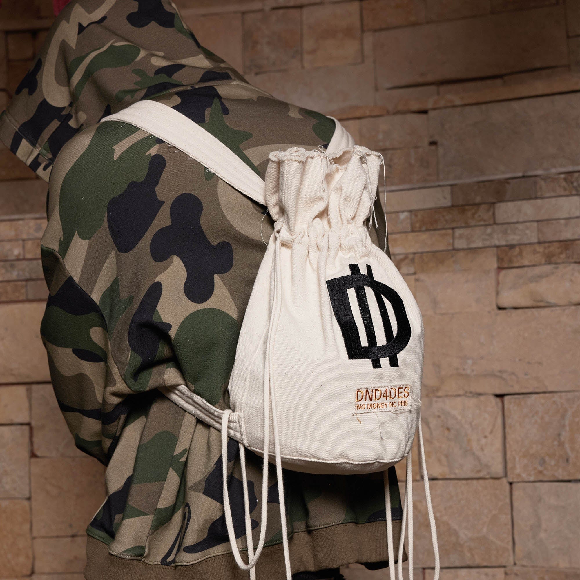 DND4DES LOGO Drawstring Bucket Backpack, premium urban and streetwear designers apparel on PROJECTISR.com, DND4DES