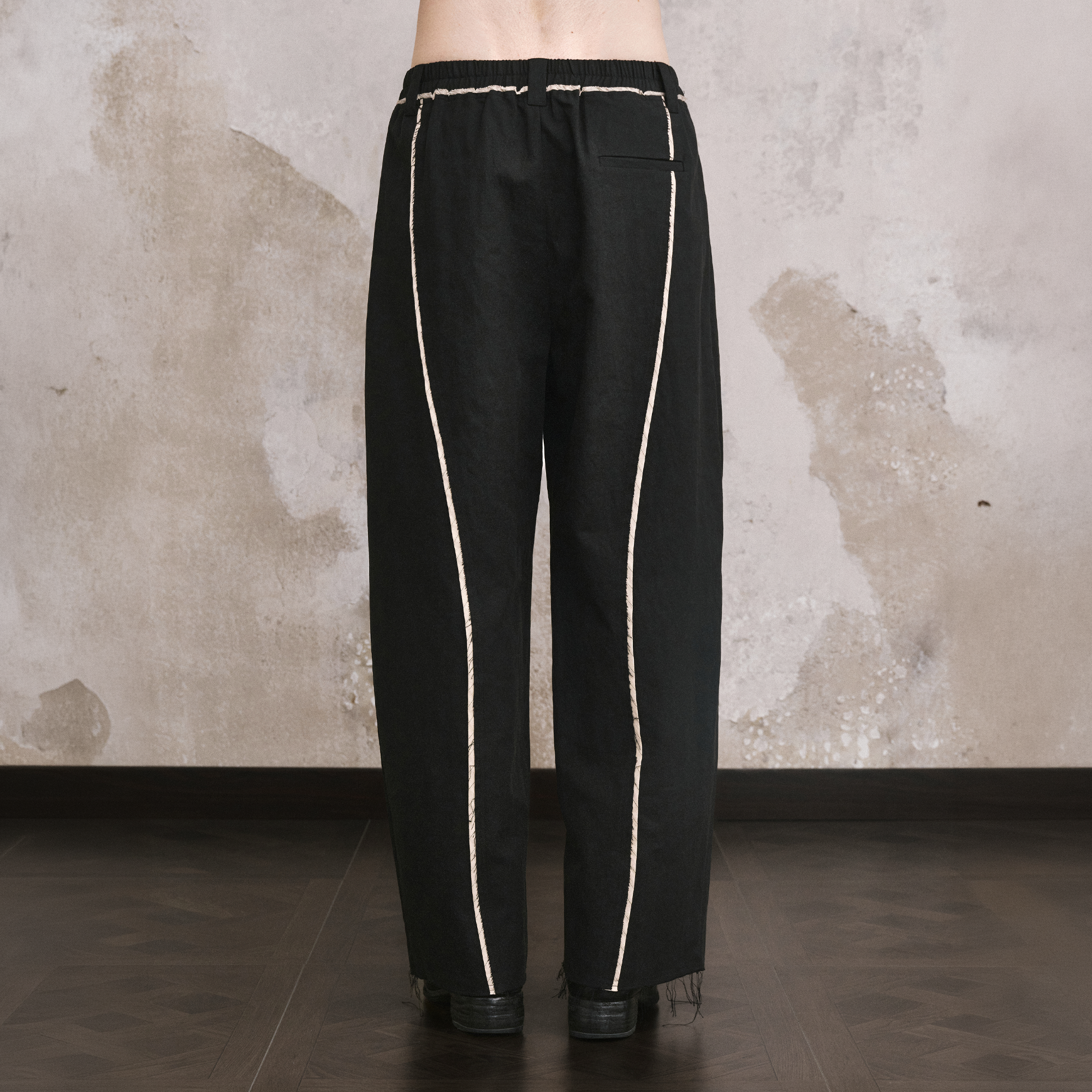ILNya Nieternite Nifutur Linen-Blend Raw Edge Curved Trousers
