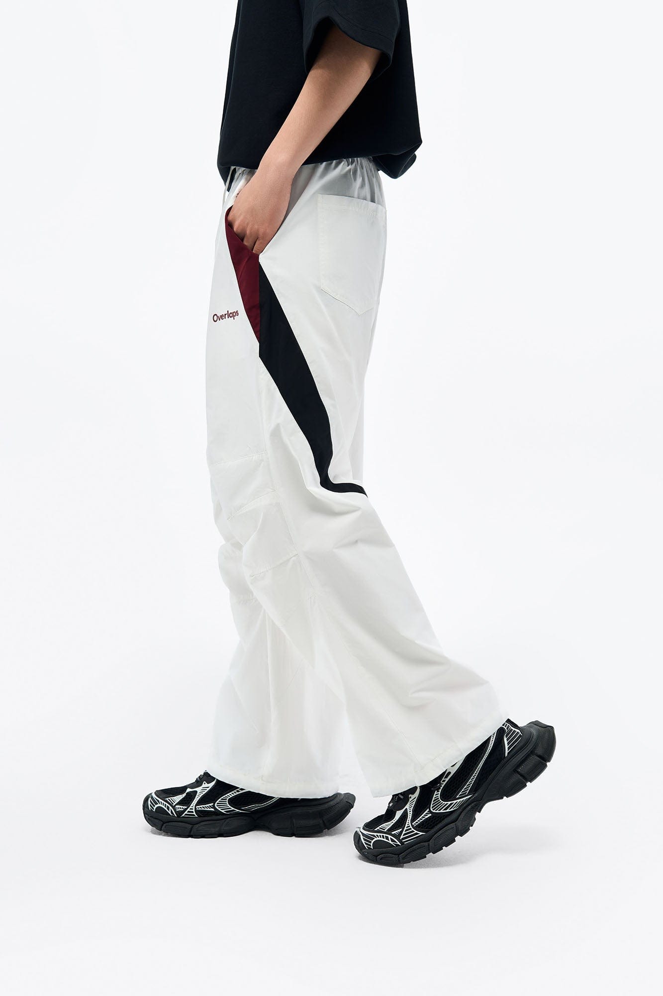 OVERLAPS Contrast Panel Crinkled-Knee Track Pants, premium urban and streetwear designers apparel on PROJECTISR.com, OVERLAPS