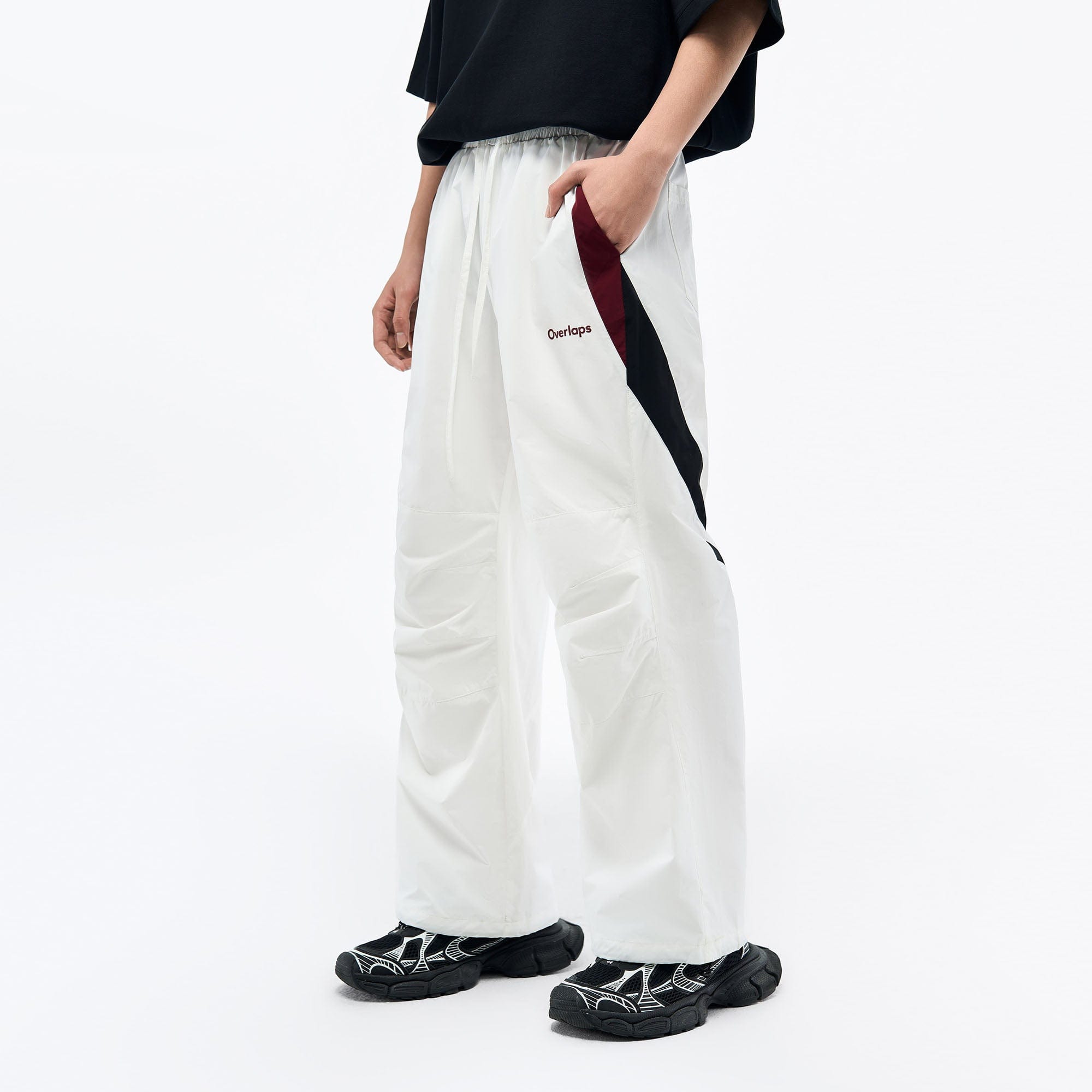 OVERLAPS Contrast Panel Crinkled-Knee Track Pants, premium urban and streetwear designers apparel on PROJECTISR.com, OVERLAPS
