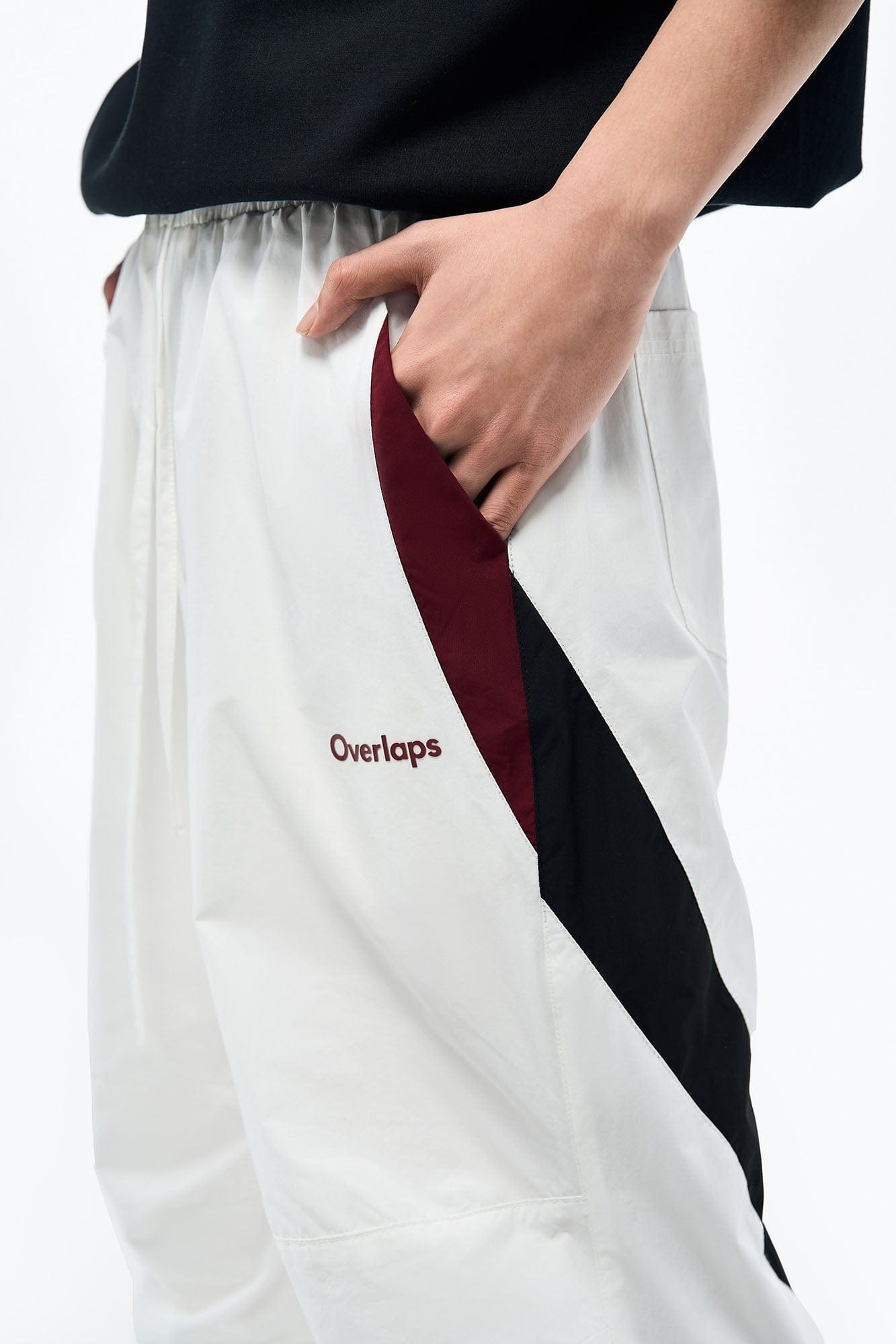 OVERLAPS Contrast Panel Crinkled-Knee Track Pants, premium urban and streetwear designers apparel on PROJECTISR.com, OVERLAPS