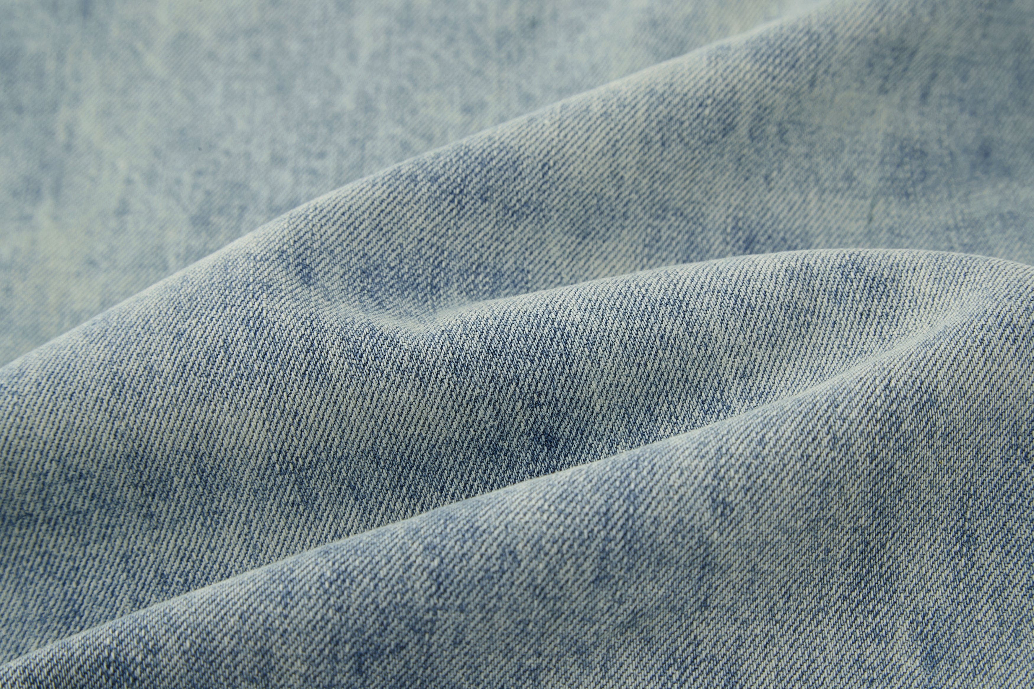 BONELESS Washed Ripped Hem Curved Baggy Jeans