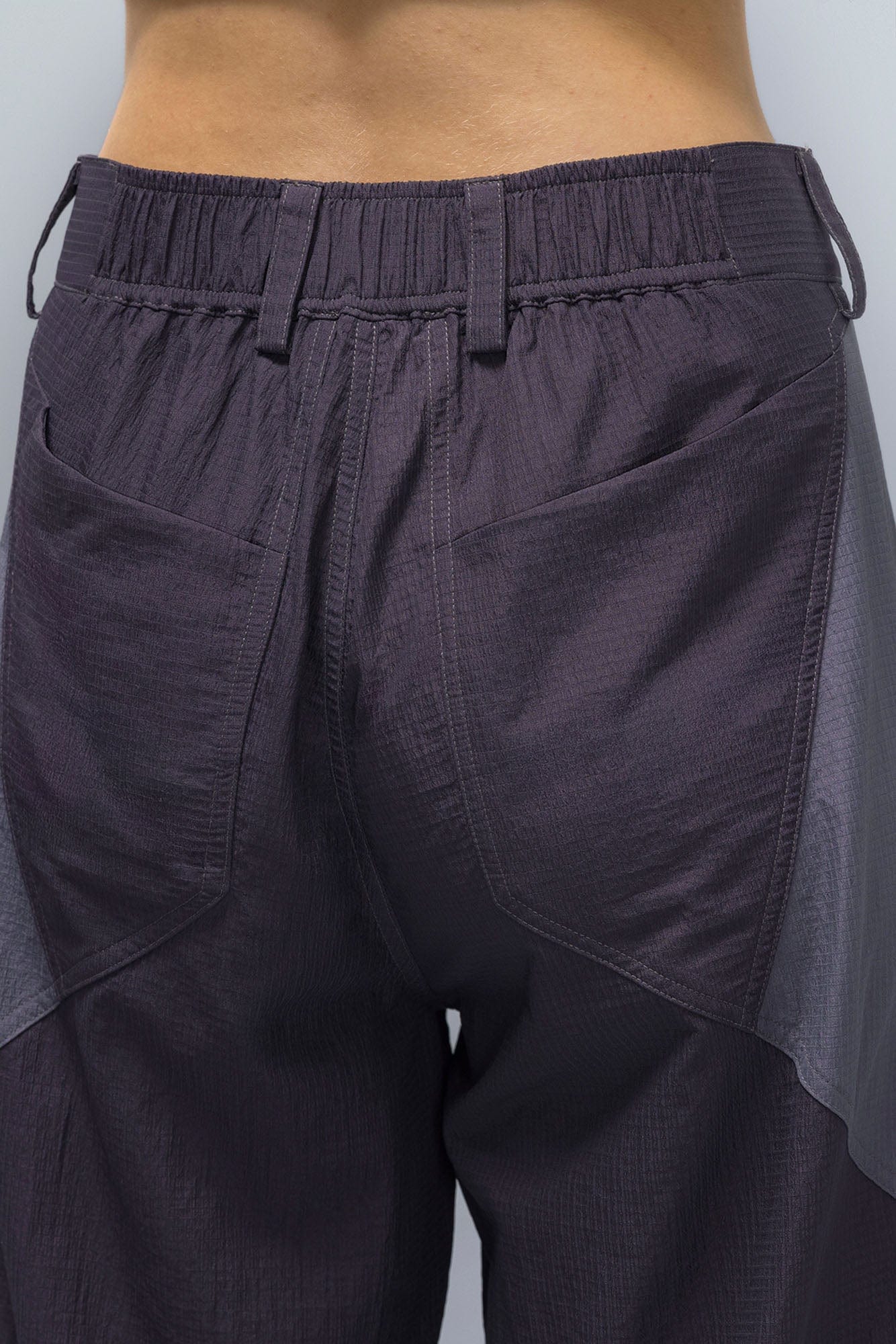 XIPHEVIL Deconstructed Contrast Panel Utility Curved Pants, premium urban and streetwear designers apparel on PROJECTISR.com, XIPHEVIL