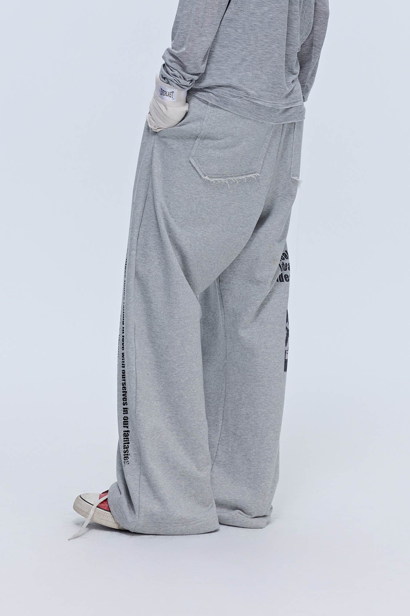 SAVAGEGROWTHWORLD Slogan Curved Drawstring Sweatpants, premium urban and streetwear designers apparel on PROJECTISR.com, SAVAGEGROWTHWORLD
