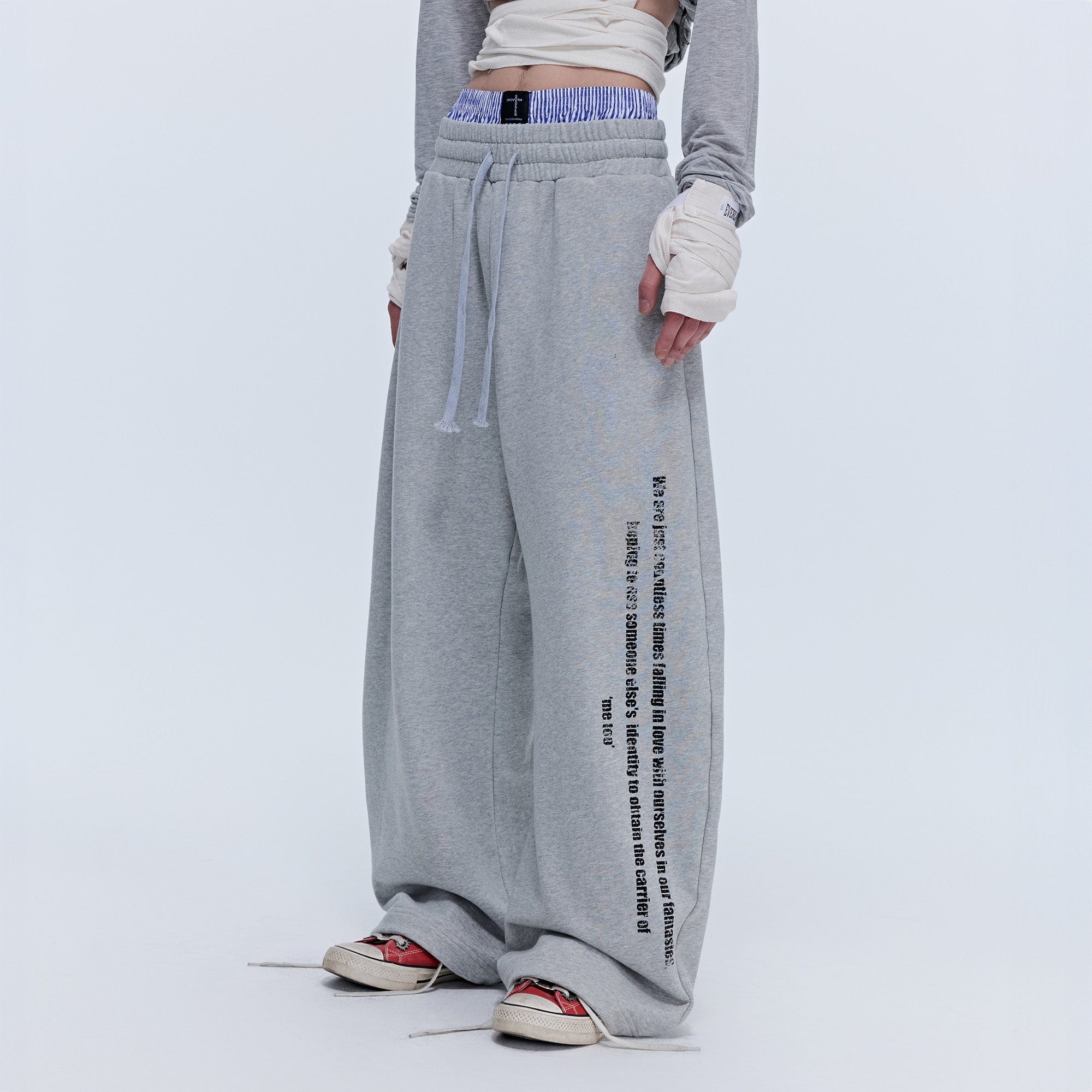 SAVAGEGROWTHWORLD Slogan Curved Drawstring Sweatpants, premium urban and streetwear designers apparel on PROJECTISR.com, SAVAGEGROWTHWORLD