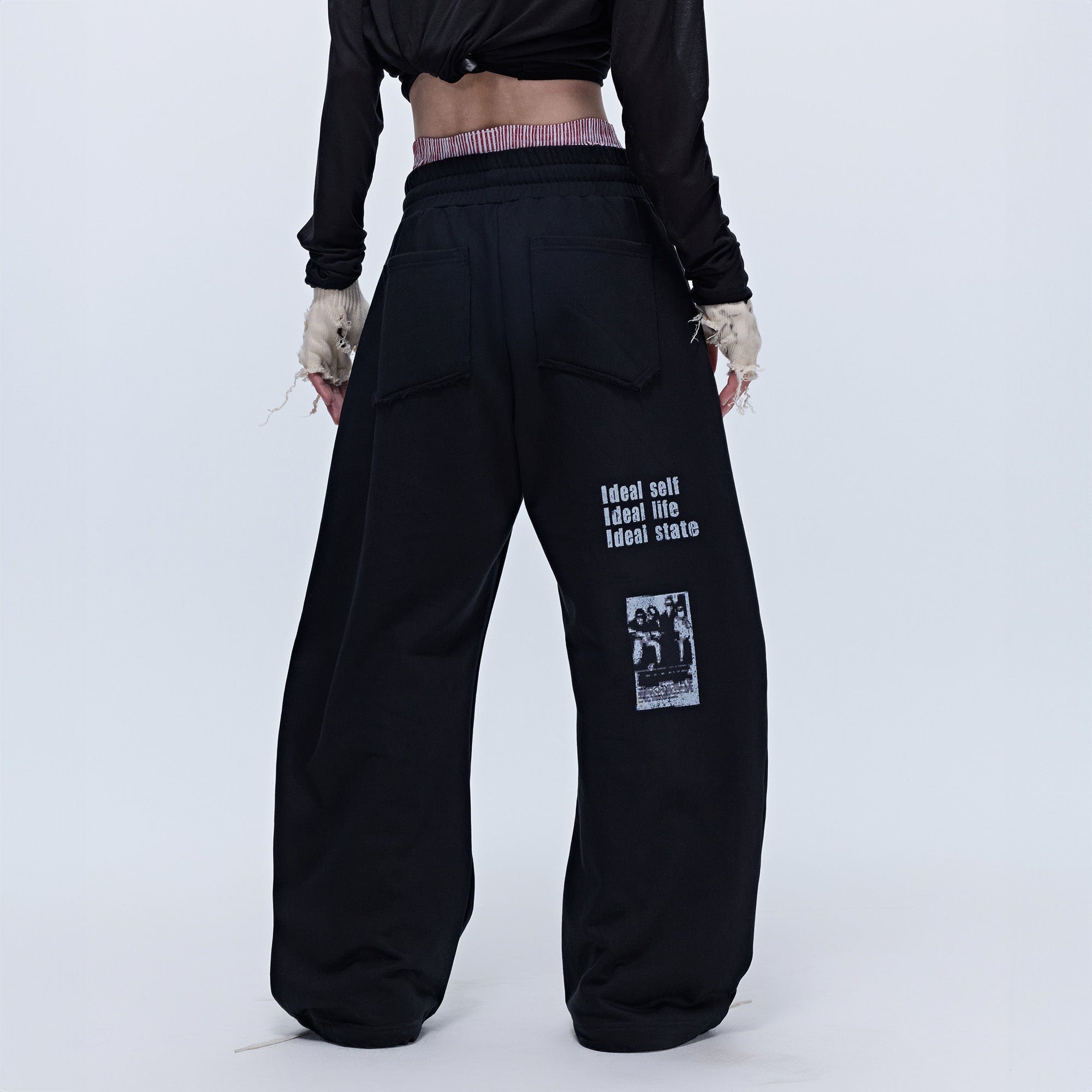 SAVAGEGROWTHWORLD Slogan Curved Drawstring Sweatpants, premium urban and streetwear designers apparel on PROJECTISR.com, SAVAGEGROWTHWORLD