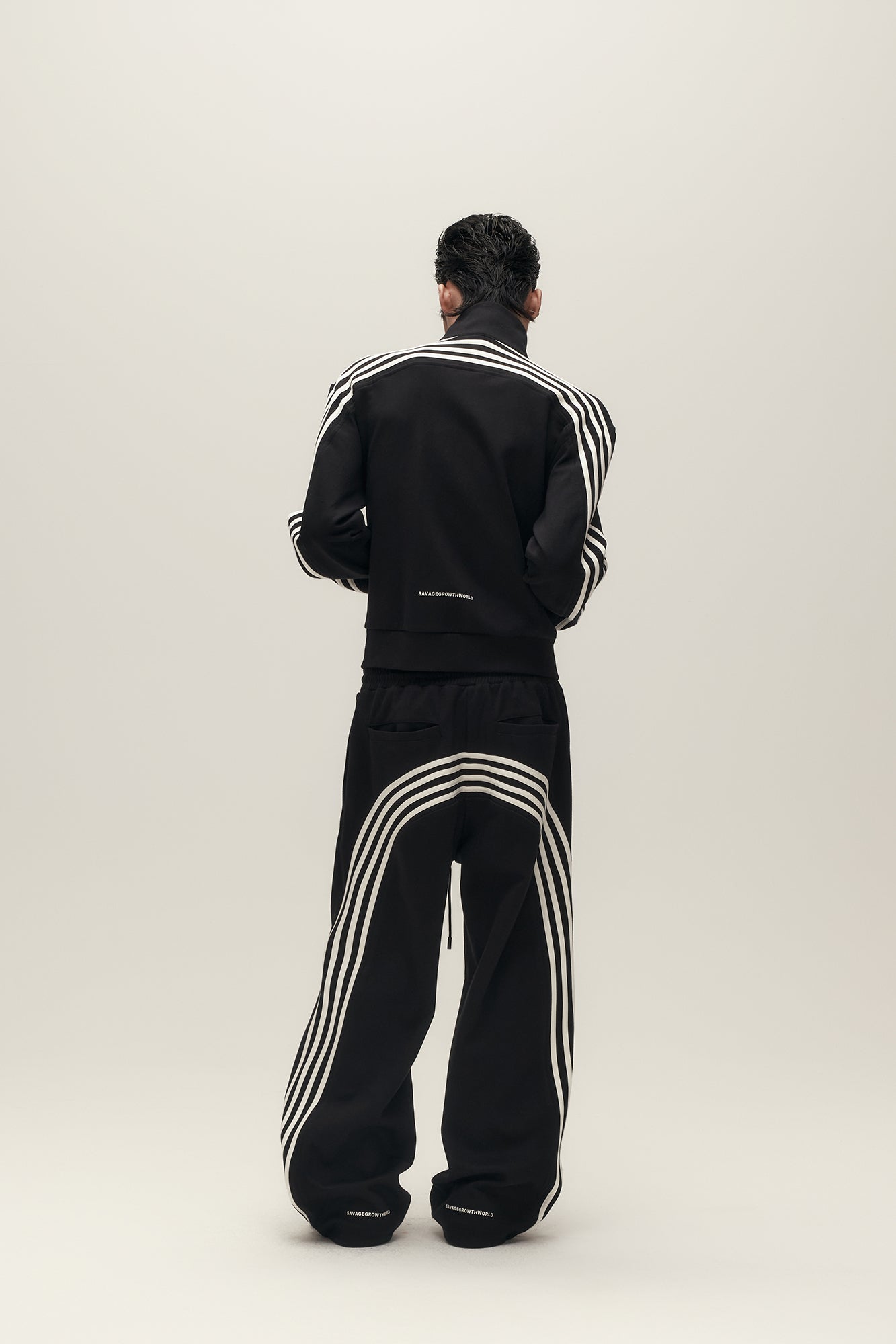 SAVAGEGROWTHWORLD Back-Arc Striped Graphic Track Pants, premium urban and streetwear designers apparel on PROJECTISR.com, SAVAGEGROWTHWORLD