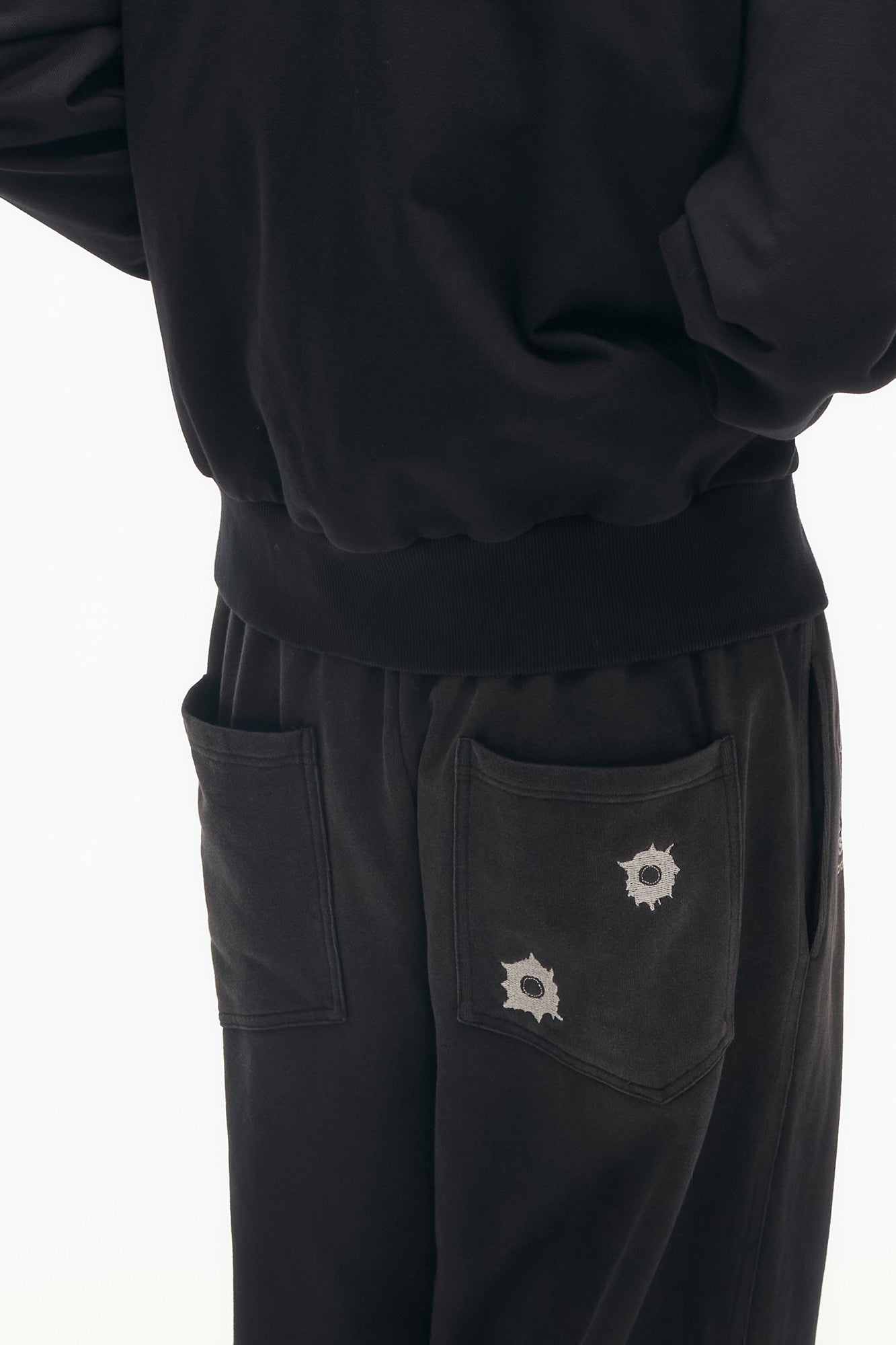 SAVAGEGROWTHWORLD Bullet Graphic Washed Wide-Leg Sweatpants, premium urban and streetwear designers apparel on PROJECTISR.com, SAVAGEGROWTHWORLD