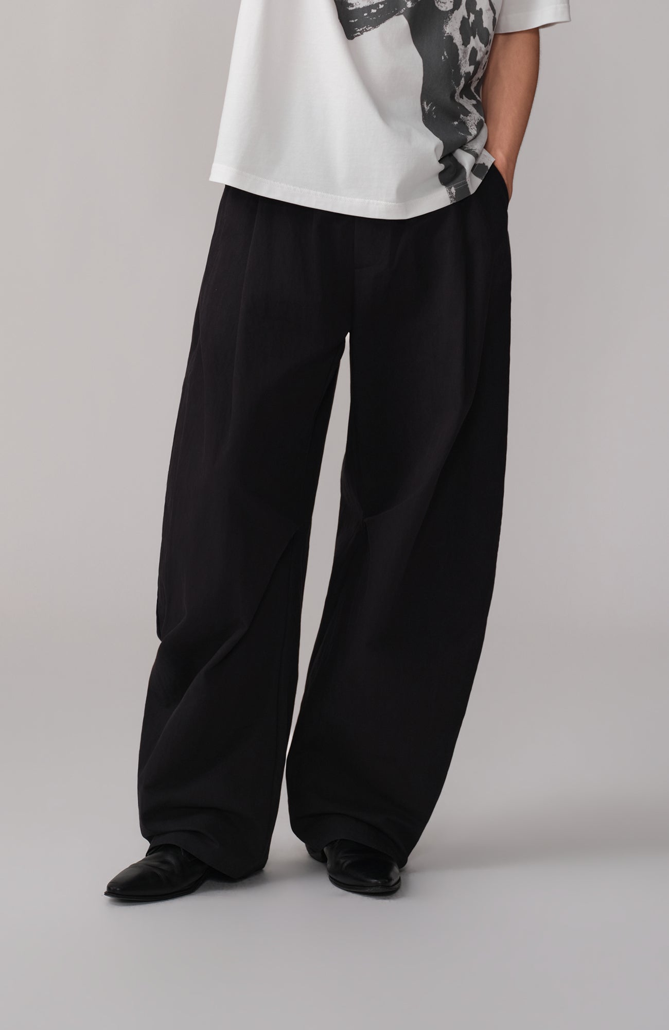 OPICLOTH Pleated Curved Wide-Leg Trousers