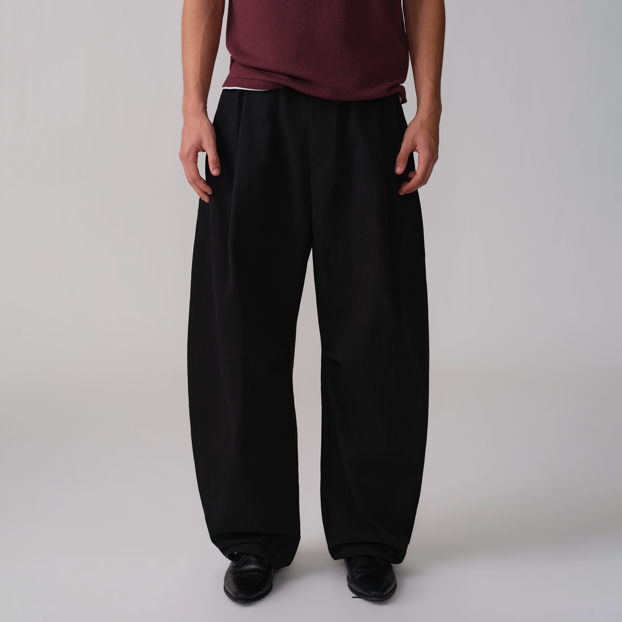 OPICLOTH Pleated Curved Wide-Leg Trousers