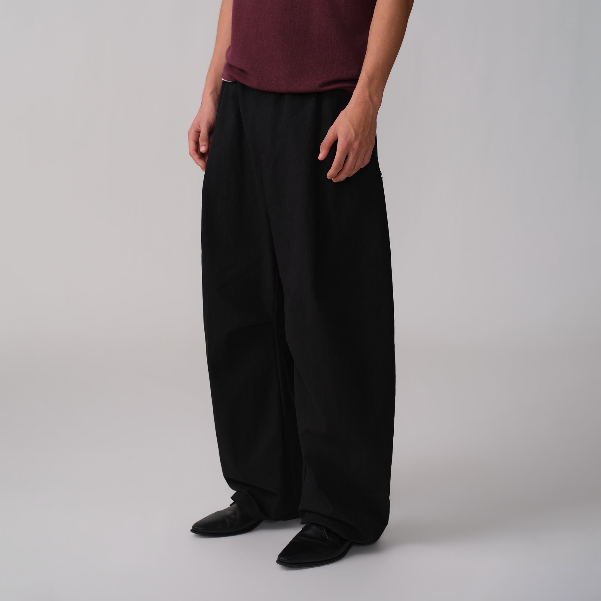 OPICLOTH Pleated Curved Wide-Leg Trousers