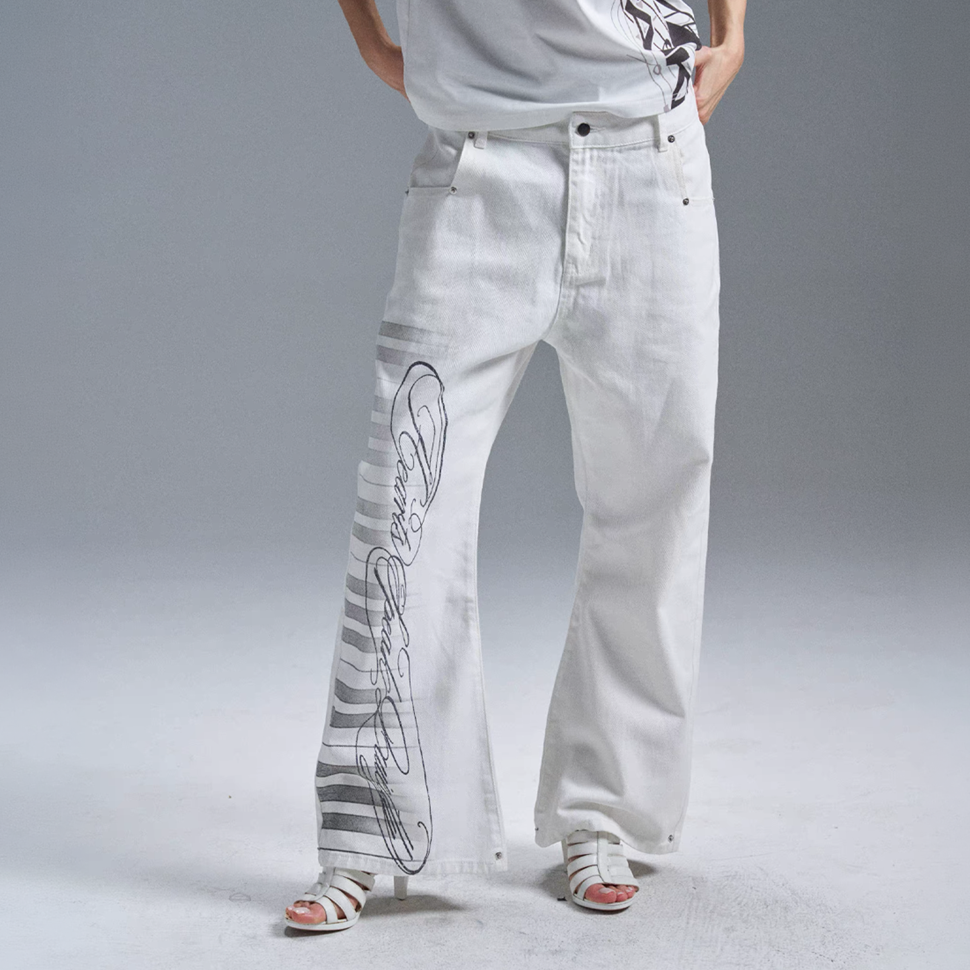 PAIKI Piano Key Script Foil Flared Jeans