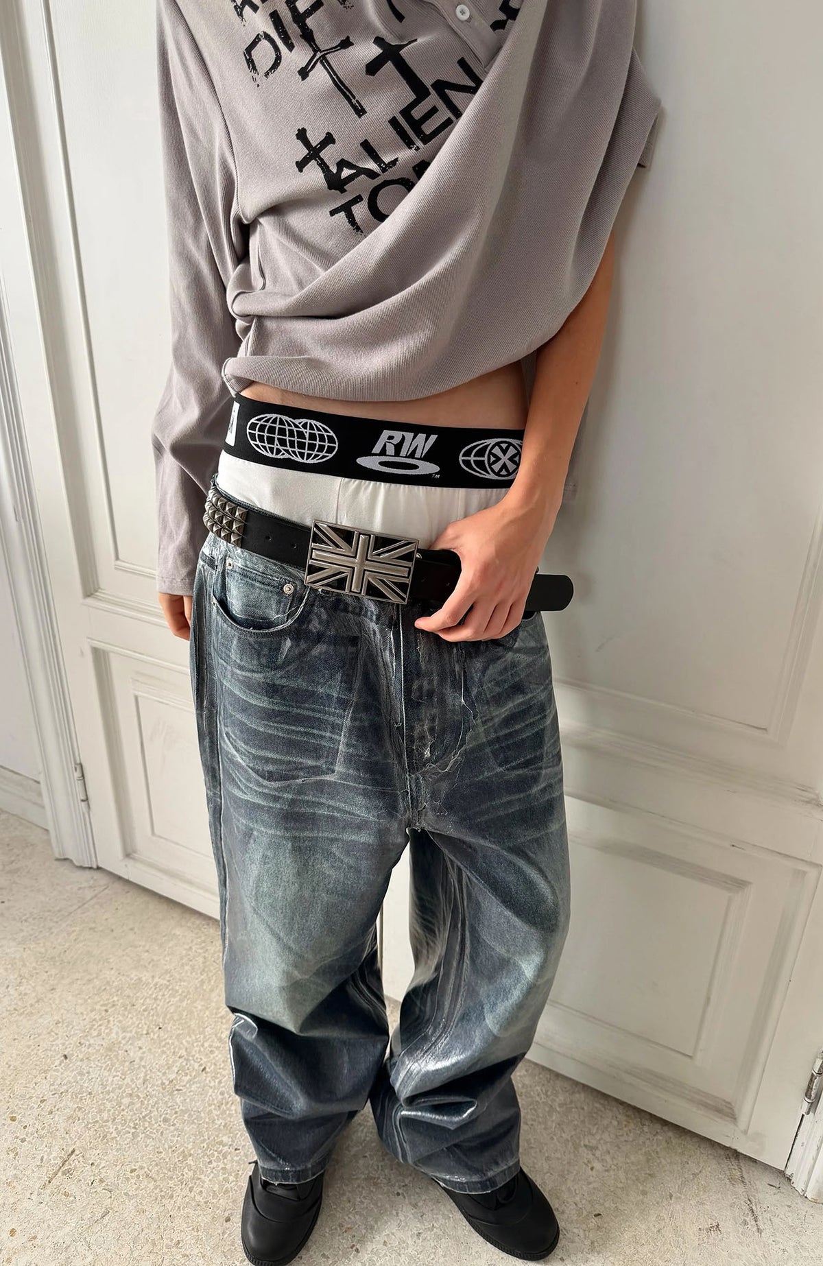 REBEL WAVE Frayed Raw-Edge Wax-Coated Flared Jeans