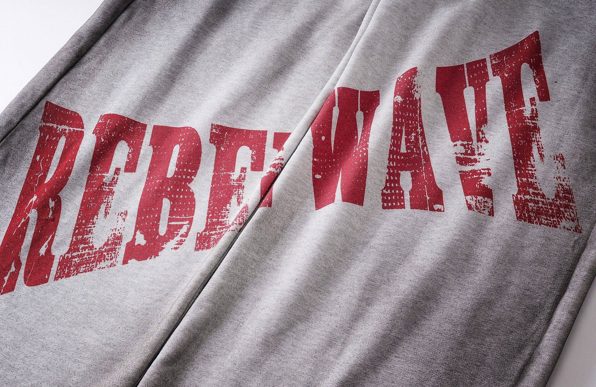 REBEL WAVE Dirty Wash Cross Graphic Sweatpants