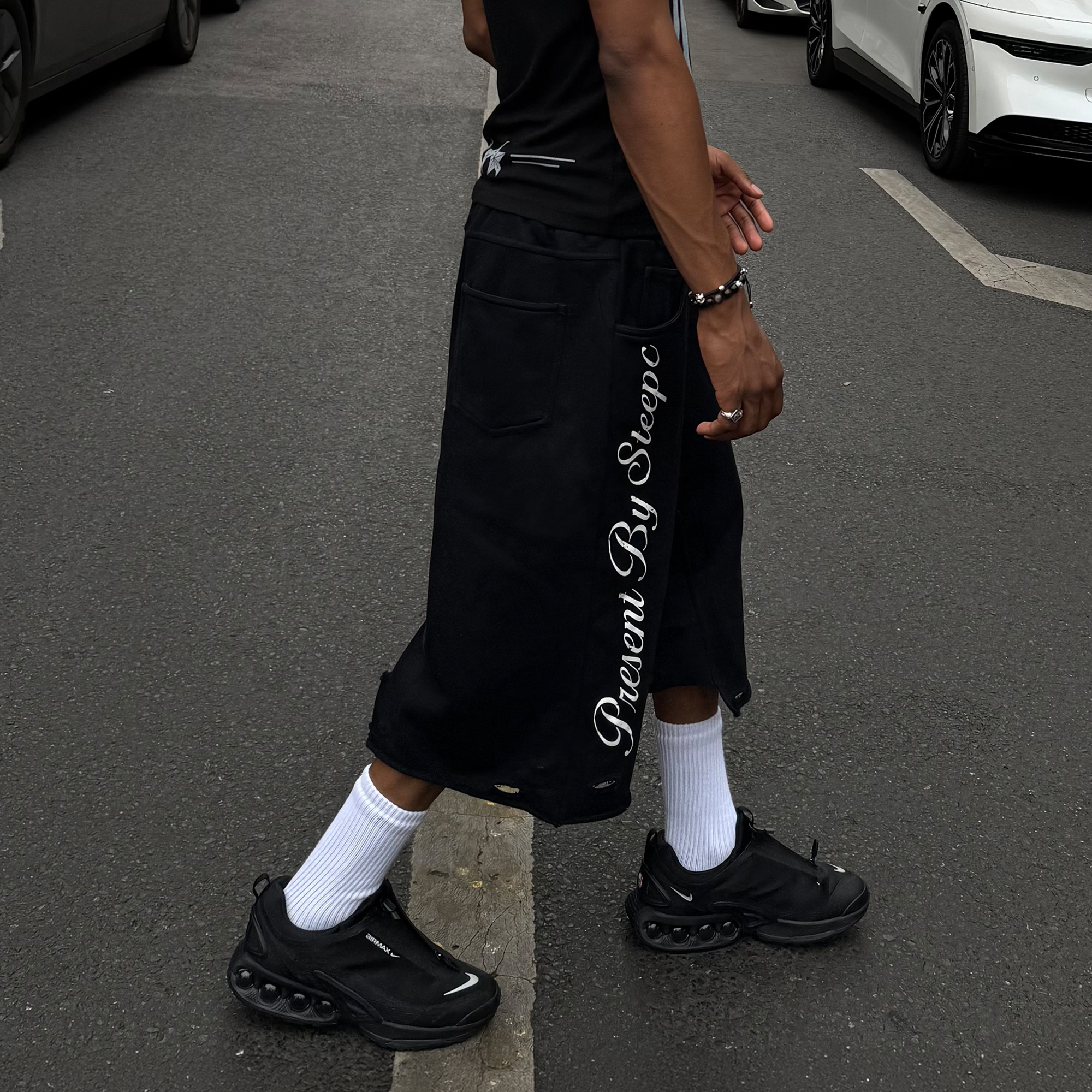 STEEPC Raw Edge Graphic Paneled Sweat Shorts