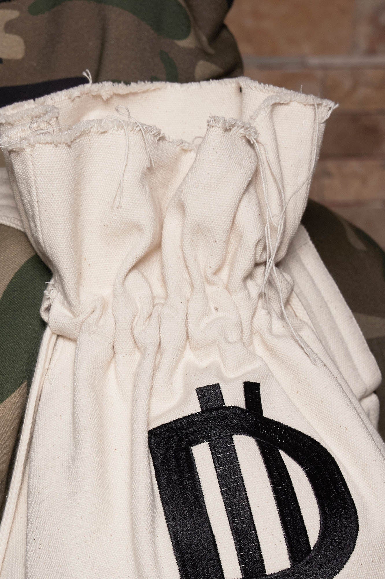 DND4DES LOGO Drawstring Bucket Backpack, premium urban and streetwear designers apparel on PROJECTISR.com, DND4DES