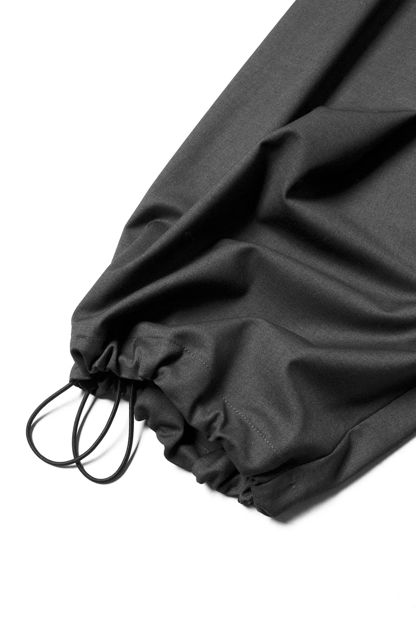 RELABEL Pleated Drawstring Curved Wide-Leg Trousers