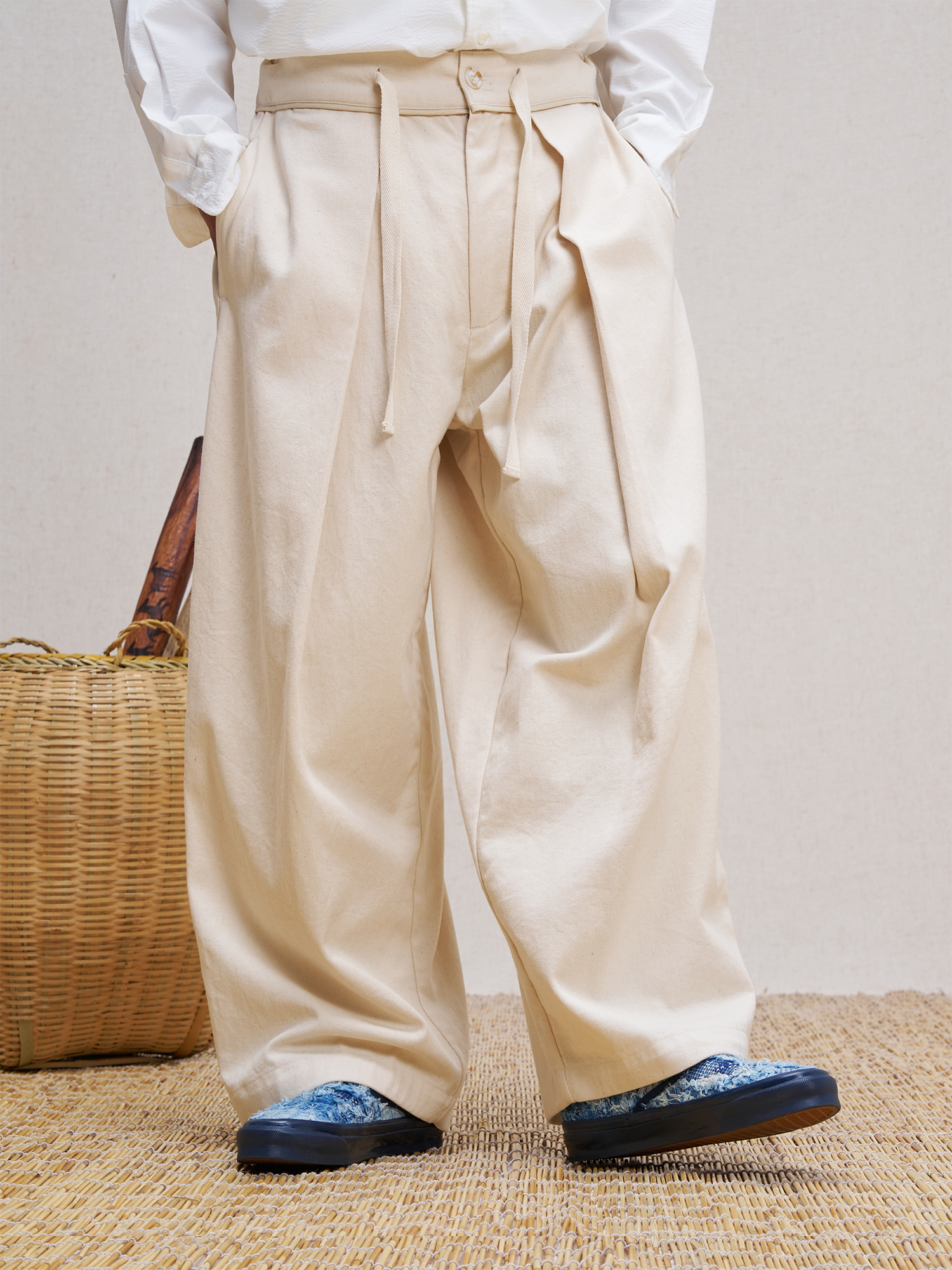 UNLIMITED MOTE Pleated Herringbone Wide-Leg Trousers