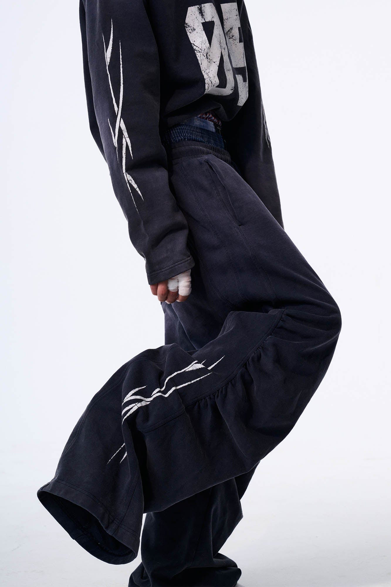 SAVAGEGROWTHWORLD Distressed Pleated Drawstring Baggy Pants, premium urban and streetwear designers apparel on PROJECTISR.com, SAVAGEGROWTHWORLD