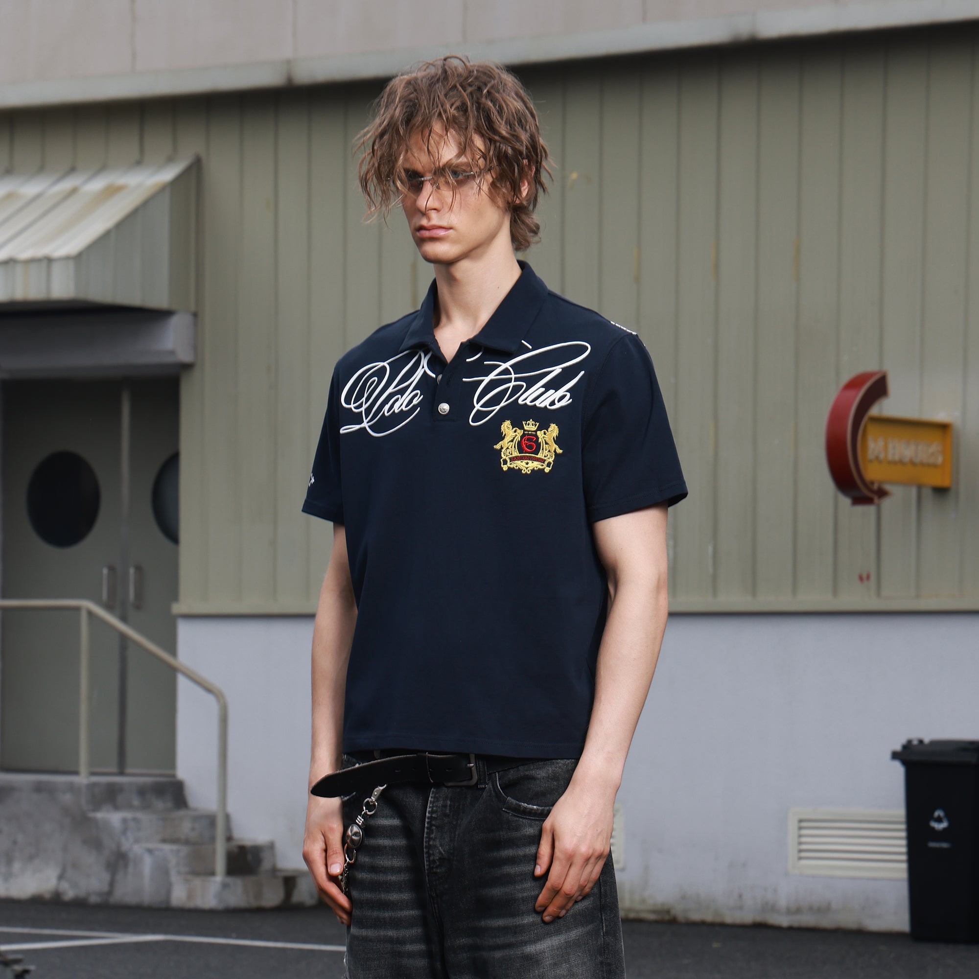 SAVAGEGROWTHWORLD Retro Crest Graphic Polo Tee