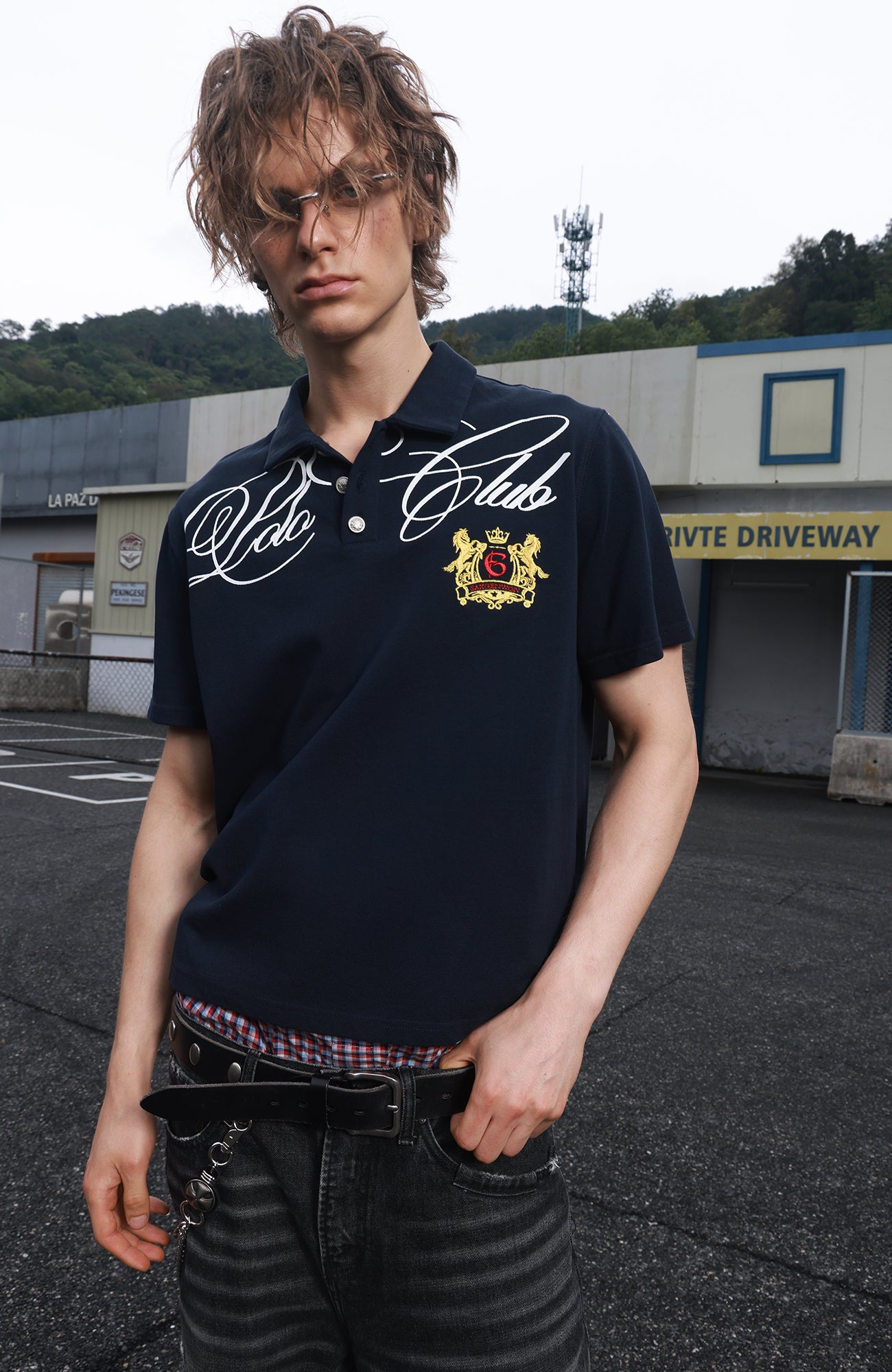 SAVAGEGROWTHWORLD Retro Crest Graphic Polo Tee