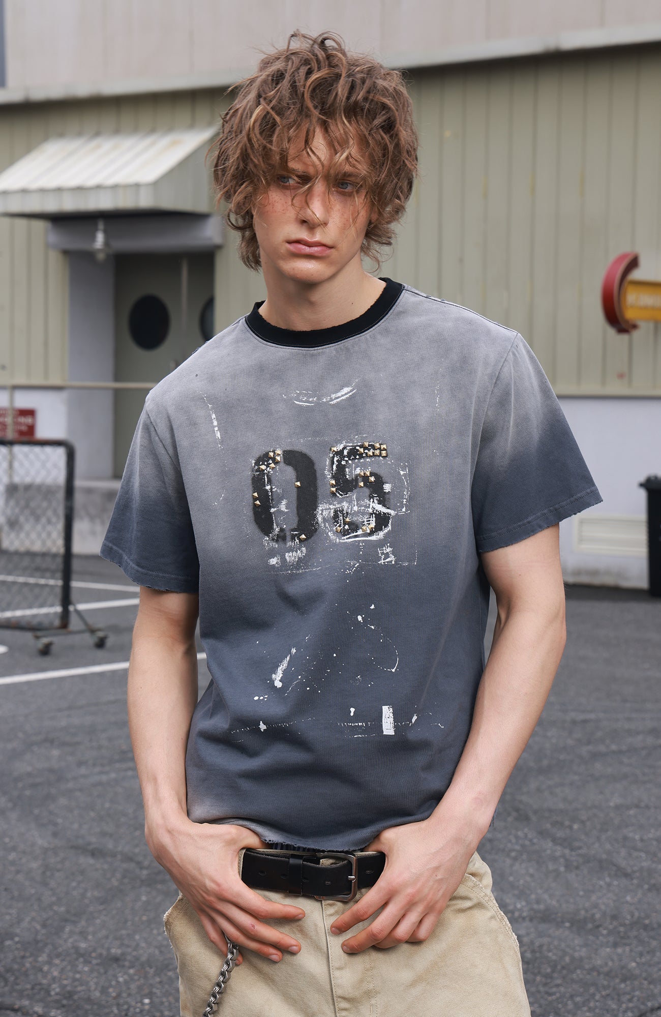SAVAGEGROWTHWORLD Studded Distressed Graphic T-Shirt