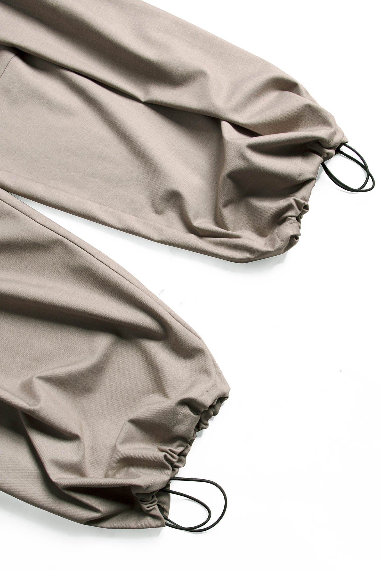 RELABEL Pleated Drawstring Curved Wide-Leg Trousers