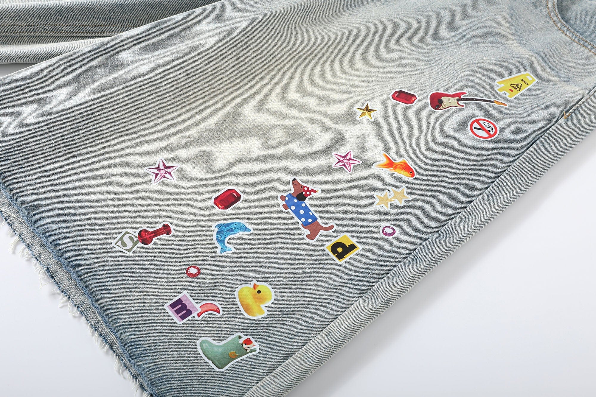 DONSMOKE Whimsical Stickers Washed Raw-Edge Shorts, premium urban and streetwear designers apparel on PROJECTISR.com, DONSMOKE